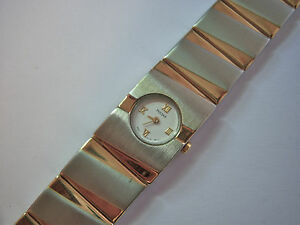 【送料無料】腕時計　レディースワイドドレッシーパルサーブレスレットゴールドトリムステンレススチールウォッチladies wide dressy pulsar bracelet watch stainless steel with gold trim