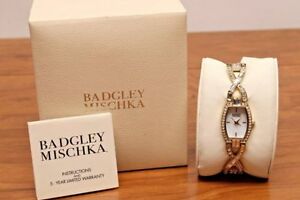 【送料無料】腕時計　スワロフスキーゴールドトーンパールクリスタルウォッチbadgley mischka ba1378mpgb goldtone swarovski mofpearl crystal watch nwt