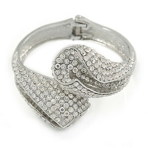 cristal claro doble hoja con bisagras brazalete en plata chapadohasta 20cm lクリスタルクリアシルバーダブルリーフブレスレットメッキ※注意※NYからの配送になりますので2週間前後お時間をいただきます。人気の商品は在庫が無い場合がございます。ご了承くださいませ。サイズの種類の商品は購入時の備考欄にご希望のサイズをご記載ください。　携帯メールでの登録ですと楽天からのメールが届かない場合がございます。