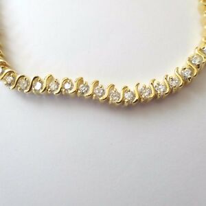 【送料無料】アクセサリー　ネックレス　カフテニスカラーゴールドbracciale donna tennis colore oro con 1 fila di zirconi bianchi 19 cm 18 j