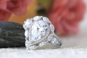 ̵ۥͥå쥹ʥkۥ磻ȥɥåȥϥ33 ct pear amp; marquise cut moissanite halo engagement ring in 9k white gold