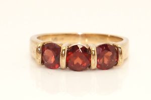 ̵ۥͥå쥹9ct18ctw3ȡ󥰥q46gstunning 9ct yellow gold 18 ctw garnet trilogy three stone ring, size q, 46g