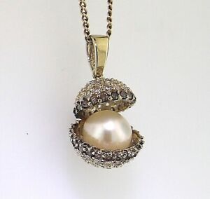 【送料無料】ネックレス　イエローゴールドクラムシェルペンダントyellow gold cultured pearl amp; gemstone clam shell pendant guaranteed genuine 9k