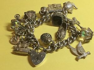【送料無料】ネックレス　ビンテージソリッドシルバーブレスレットグラムvintage heavy 925,solid silver charm bracelet, 14 x large charms, 105,grams,