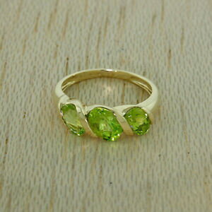 【送料無料】ネックレス イエローゴールドペリドットドレスリング¥uk hallmarked 9ct yellow gold 195ct peridot trilogy dress ring rrp 205 if10