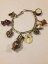 ̵ۥͥå쥹ƥ󥰥Сإӡ֥쥹åȥեantique sterling silver heavy charm bracelet 9 large charms 8 figaro chain 52g