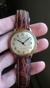 【送料無料】　腕時計　1975タイメックスマカジキmens goldtone1975 timex marlin mens goldtone wristwatch with date function