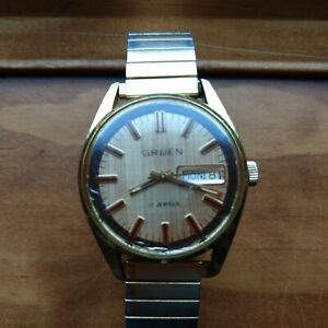【送料無料】　腕時計　ビンテージメンズゴールドジュエルvintage mens 1970s gold gruen 17 jewel wrist watch day date runs