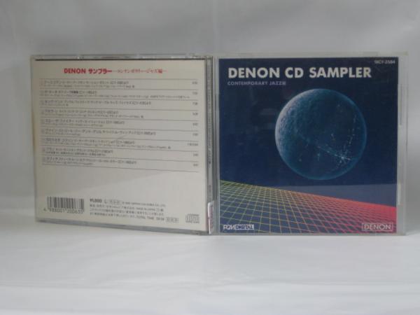 ♪#6 00525♪ 【中古CD】DENON CD SAMPLER CONTEMPORARY JAZZ編 ピーター・アースキン 他 「アースコマン」「ザ・サーチ」「キング・ケント」他。全9曲収録。ジャケットに、日焼けあり。ジャケットに、ヒビあり。 ◎ 購入前にご確認ください ◎ □商品説明 ◎中古品（レンタル落ち・販売落ち）のCDになります。 ◎中古品のため再生・動作に影響ない程度の使用感・経年劣化がある場合がございます。 ◎ケース・パッケージ・盤面の汚れやシール等に関して、こちらでできるだけクリーニング致しますが、取れない場合がございます。 ◎ケースに割れ、キズなどがある場合がございます。 ◎ケースが著しく破損、欠損している場合は写真に映っているものとは別のケースで送らせていただく場合がございます。 ◎帯や歌詞カード・ジャケットは、破れやテープ補強、もしくは付属していない場合がございます。 ◎状態について神経質な方はご購入をお控えください。 ○受注受付は24時間行っておりますが、別サイト併売の為、品切れの際は申し訳ございませんがキャンセルとさせていただきます。 その際、必ずメールにてご連絡させていただきますが、お客様の設定によっては受信できない可能性もございますことをご理解・ご了承いただきたくよろしくお願いいたします。