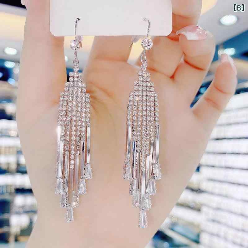 イヤリング 女性用 ロング フリンジ 輝く 大ぶり 個性的 ファッション アクセサリ...