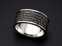 Lord's Prayer Ring イエス・キリスト自身が弟子達に伝えられたと言われている祈祷文を刻み込んだシルバーリング。 オールドイングリッシュ書体を1文字あたり0.9mmのサイズで彫り込んでおります。 また祈祷文の両脇には聖書と十字架をモチーフとしたレリーフを施し、スタイリッシュな雰囲気をかもし出しております。 リングの材質はシルバー950を使用しており、シルバーアクセサリーによく使われるシルバー925に比べ銀の純度が高く、変色しにくいのが特長です。 （お使いになられる環境によって変色が早く進む場合がございます。） また圧延材と呼ばれる、圧力をかけて延ばした地金を使用しておりますので、地金の密度が高く傷が付きにくくなっております。（落としたり、ぶつけたりしますと傷がつきますのでご注意下さい。）尚、こちらの商品をお買い上げ頂いた方には文字が大きく見えるように拡大鏡をお付けします。 サイズ：幅10mm　厚み：(最大)2mm 材質：シルバー950 Our Father, who art in heaven, hallowed by Thy name. Thy kingdom come, Thy will be done, on earth as it is in heaven. Give us this day our daily bread; and forgive us our debts, as we forgive our debtors; And lead us not into temptation, but deliver us from evil. Amen.【日本語訳】 天にまします我らの父よ、願わくば、御名の尊まれんことを。 御国の来たらんことを。 御旨の天に行なわるる如く、地にも行なわれんことを。 我らの日用の糧を、今日我らに与えたまえ。 我らが人に許す如く、我らの罪を許したまえ。 我らをこころみに引きたまわざれ、我らを悪より救いたまえ。 国と力と栄光は、限りなくあなたのもの。　アーメンキリスト教の祈祷文「Lord's Prayer」を刻み込んだシルバーリングです。 文字の両脇には聖書と十字架をモチーフにしたレリーフを施しました。 書体にはオールドイングリッシュを用いておりますので、スタイリッシュな雰囲気も味わう事が可能です。 こちらの商品は文字が非常に細かい細工の為、購入後のサイズ直しが出来ません。ご注文の際にはサイズ選択にご注意下さい。偶数号をご希望の場合は＋2,000円（税別）にて承ります。 自分のサイズが分からないという場合は先に「リングゲージ」をお買い求めの上、ご注文下さい。 画像をクリックすると拡大画像がご覧いただけます。 「Lord's Prayer」とは直訳すると「主の祈り」という意味です。 よく洋画などで食事の前に祈りを捧げるシーンがありますが、その時の台詞がこの祈祷文です。 この祈祷文は新約聖書によるとイエス・キリスト自身が弟子達に教えたと言われており、キリスト教のほぼ教派で唱えられております。 彫銀独自の超精密微細彫刻によって刻まれた文字の大きさはわずか0.9mm。国内外のジュエリーメーカーとも取引のある彫銀が長年培った技術ならではの仕上がりです。 オールドイングリッシュ独特のディテールもしっかりと再現されております。 （大文字は一回り大きなサイズで制作しております。） 表面に軽く傷をつける程度の彫刻とは異なり、このリングは文字をはっきりと認識することが可能です。 文字のシャープさを保つ為に仕上げにも神経を使っております。 「キズ見」「ルーペ」などを用いて細かい文字の1文字1文字をそれぞれの工程でチェックを行います。どの段階であっても不備が見つかった品物は1から作り直しとなります。その場合、お待たせしてしまうこともございますがご了承下さいませ。 こちらのリングは幅が約10mmほどあり、一般的な結婚指輪などのリングに比べ幅広に作られております。 細い指輪と同じサイズにした場合きつく感じることがございますので、 リングサイズを選択される際は細いリングに比べ1号程度大き目にすることをお薦めいたします。 リングサイズは【時間帯（※1）】【季節（※2）】によっても多少変わりますのでお気をつけ下さい。 ※1【時間帯】…朝や夕方になると指がむくんでリングがきつく感じやすくなる方が多いようです。リングゲージが手元にある場合は1日の中で何度か測ってみることをお薦めします。 ※2【季節】…冬場の寒い季節に比べ夏の暑い季節の方がきつく感じる方が多いようです。 こちらのアイテムは、ご注文を頂いてから、ひとつひとつ手作りする完全受注生産商品です。 そのため、ご注文から商品の発送まで約2〜3週間ほどお時間をいただきますので、予めご了承の上、楽しみにお待ち下さいませ。