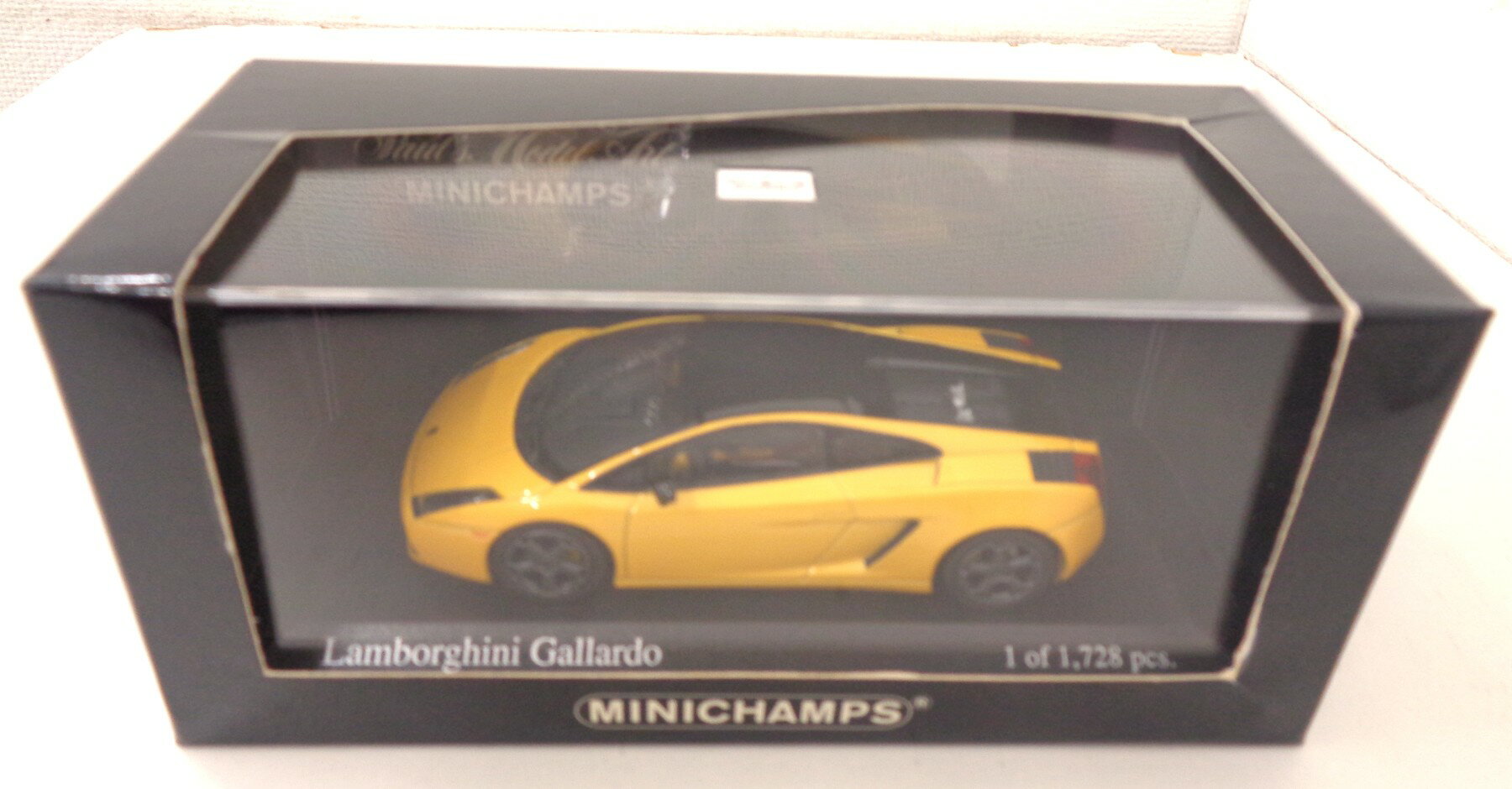 樂天商城 - 【中古】 その他 スケールミニカー(1/43) ミニチャンプス　 Lamborghini Gallardo SE 2006(イエロー) 【B】 ※外箱傷み及びクリアケースに少量の傷あり　※商品の性質上多少の塗装ムラ等はご容赦下さい