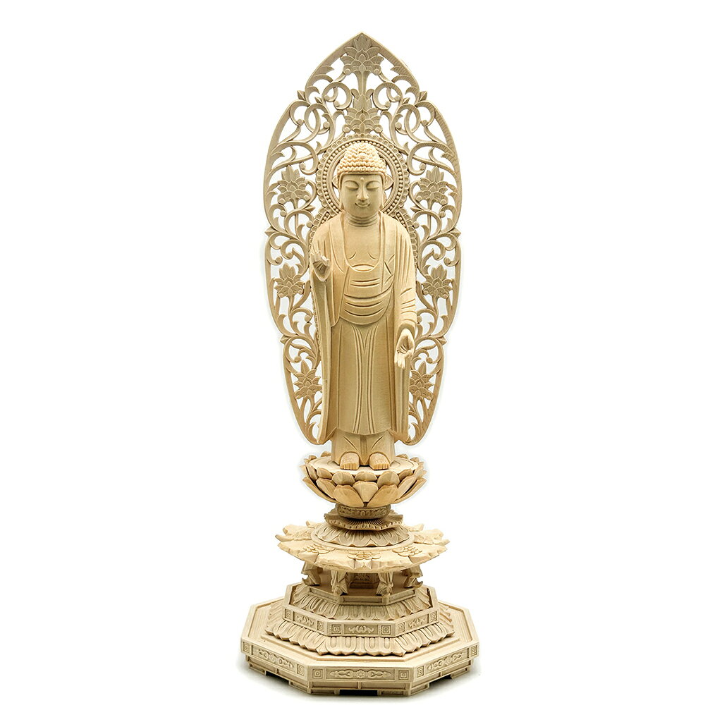 商品詳細 サイズ 身丈5.0寸　総高：33.5cm、幅：12.5cm、奥行き：12.5cm 材質 桧木（ヒノキ） 加工方法 白木木彫り 商品特徴 仏身：阿弥陀如来 台座：八角台 光背：唐草 高級桧木を素材に、伝統を踏まえた高度な彫刻技術を持つ熟練の仏師が、一つ一つ心を込めて彫り上げましたお像です。その尊顔と穏やかな表情を拝するとき、仏の教えにおける大慈悲を感じ、自然と心の安らぎが得られ、苦難を取り除き、平安を守ることとなります。 関連情報説明 西方極楽世界の教主。天台宗、浄土真宗のご本尊とされています。 また、戌、亥年生まれの守り本尊(守護仏)でもあります。 阿弥陀のほかに無量寿、無量光などとも言われる。大無量寿経によれば、もとは、この尊はインドの王族の出身で世自在王仏の教化で出家し、名を法蔵比丘と改め、五劫の間修行を重ね、殊勝の四十八願をたて、西方極楽浄土の王となり、一切衆生を利益する大慈大悲の無量仏となり、今も説法していると説く。阿弥陀三尊は脇侍として観音・勢至菩薩をもつ。印相には上品上生から下品下生までの九品住生に阿弥陀定印、四十八願印、蓮華蔵印などがある。 商品用途 仏壇の置物、ビジネス贈り物、風水・開運グッズ、玄関の置物、茶卓置物および、家庭装飾などとして使われます。もちろん、店、会社の社長室、応接室、オフィス、書斎、リビングルームの近くに置くこともできます。 注意書き 材質は桧木を使用しております。 天然の木材を使用しているため、木目の色が画像と多少違う場合や多少黒い節がある場合がございますが不良品ではありません。万が一、商品に割れ等の不良があった場合には交換いたします。 阿弥陀如来 阿弥陀 無量寿仏 仏壇 木彫り仏像 木製仏像 桧木製 彫刻仏像 立像 仏壇用 置物 ご本尊安置 仏壇安置 守護仏 自宅供養 先祖供養 故人供養 法要準備 年忌法要 お盆 お彼岸 仏間用 新仏壇準備 買い替え 仏具準備 坐像安置 ご祈願 家内安全 開運 贈り物