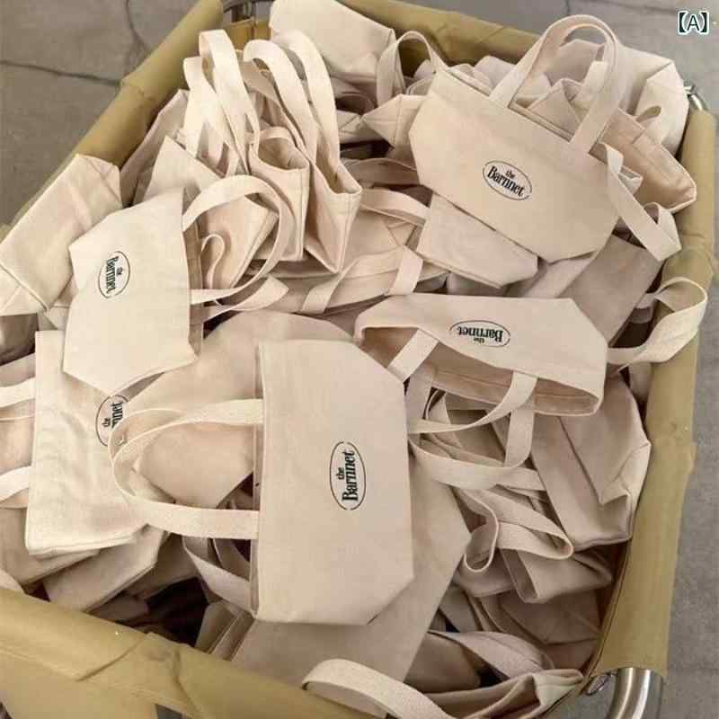 ビジネスバッグ 軽量 軽い ビジネスバッグ 軽量 軽い 2025 起爆 金 韓 風 八 乳 手提げ小 布袋 韓国 博 主 シンプル アルファベット 手提げ ミニ 布 包x2