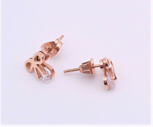 Rakuten - サージカル ステンレス リボン ピアス CZ
