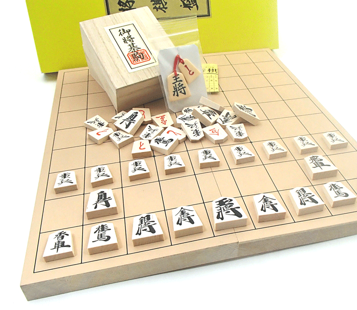 木製将棋盤セット　囲碁ラボオリジナルP製根付け2個つき　新桂7号折将棋盤と人気ナンバー1の優良押し将棋駒（裏赤）