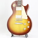 Gibson Les Paul Standard '60sギブソンの定番モデル「レスポール・スタンダード」が入荷！コチラは、AAフィギュア・メイプルトップやスリムテーパーのネックシェイプを採用した60's仕様採用モデルです。ウエイトリリーフを施さないソリッドボディに、握りやすいスリムテーパーのネックをジョイント。キャビティはトラディショナルモデルと同様に、基盤を使わず配線されており、コンデンサーはオレンジドロップが使われております。サウンドの要であるピックアップには、バーストバッカー61R&バーストバッカー61Tを搭載。芯のあるクリーントーンはもちろん、歪ませても骨太でバランスの良いドライブサウンドを奏でてくれます。ギブソン王道のロックサウンドを求めるギタリストには是非ともオススメの1本です。是非この機会をお見逃しなく！Weight≒3.96kgBodyMaterial: MahoganyTop: AA Figured MapleWeight Relief: NoneNeckNeck: MahoganyProfile: Slim TaperNut width: 1.695 / 43.05mmFingerboard: RosewoodScale length: 24.75 / 628.65mmNumber of frets: 22Nut: Graph TechInlay: Acrylic TrapezoidsHardwareBridge: ABR-1 Tune-O-MaticKnobs: Gold Top Hats with Silver Reflector & PointersTuners: Grover Rotomatics w/ Kidney ButtonsPlating: NickelElectronicsNeck pickup: Burstbucker61RBridge pickup: Burstbucker61TControls: 2 Volumes， 2 Tones & Toggle Switch (Hand-wired with Orange Drop Capacitors)ハードケース付属イケベカテゴリ_ギター_エレキギター_Gibson_Les Paul Models_新品 JAN:4580228786963 登録日:2024/03/27 エレキギター ギブソン レスポール