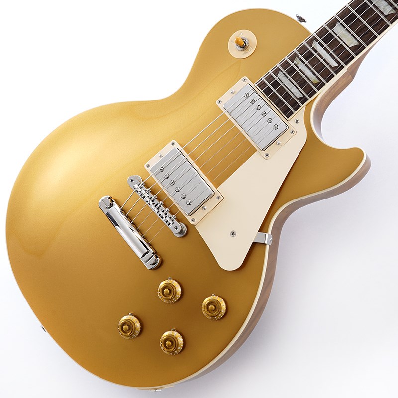 Gibson Les Paul Standard 50sギブソンの定番モデル「レスポール・スタンダード」が入荷！コチラは、王道のメイプルトップ、マホガニーバックを採用したクラシックな50'sルックスモデルです。ウエイトリリーフを施さないソリッドボディを採用、ネックシェイプは程よいグリップ感のあるVintage 50sを採用しています。キャビティはトラディショナルモデルと同様に、基盤を使わず配線されており、コンデンサーはオレンジドロップが使われております。サウンドの要であるピックアップには、バーストバッカー1&バーストバッカー2を搭載。野太いクリーントーンはもちろん、歪ませても無骨でありながらもバランスの良いドライブサウンドを奏でてくれます。ギブソン王道のロックサウンドを求めるギタリストには是非ともオススメの1本です。是非この機会をお見逃しなく！Weight≒4.42kgハードケース付属BodyMaterial:MahoganyTop:MapleWeight Relief:NoneNeckNeck:MahoganyProfile:Vintage 50sNut width:1.695 / 43.05mmFingerboard:RosewoodScale length:24.75 / 628.65mmNumber of frets:22Nut:Graph TechInlay:Acrylic TrapezoidsHardwareBridge:ABR-1 Tune-O-MaticTailpiece:Aluminum Stop BarKnobs:Amber Top Hats w/ PointersPlating:NickelElectronicsNeck Pickup:Burstbucker 1Bridge Pickup:Burstbucker 2Controls:2 Volumes， 2 Tones & Toggle Switch (Hand-wired with Orange Drop Capacitors)イケベカテゴリ_ギター_エレキギター_Gibson_Les Paul Models_新品 JAN:4580228786925 登録日:2023/05/25 エレキギター ギブソン レスポール