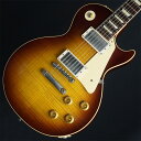 Gibson Custom Shopラインナップ内でも最高峰モデルのMurphy Lab。極上のフレイムメイプルトップにエイジドを施した1959 Les Paulの中古品が入荷！長きに亘り培われた高い製作技術と飽くなき探究心、厳選されたマテリアルにより至高のエレキギター・ベースを製作するために1993年に立ち上げられたGibson Custom Shop。現在もなお昔ながらのハンドクラフト製法と、徹底的に追求したヴィンテージの知識から製作されたカスタムショップ・ラインナップは、他所の追従を許さないほどの見事な作りとなり、プレイヤーの内に秘めるインスピレーションを際限なく沸き立たせてくれる最高の愛機となるでしょう。〜Murphy Labとは〜カスタムショップ内に誕生したMurphy Lab（マーフィー・ラボ）は、ナッシュヴィルのギブソン・カスタムショップ内に新設されたラボで、科学的検証に基づく最新の技術を駆使して、ギターのエイジング（ヴィンテージ・ギターの経時変化した外観と弾き心地を再現する処理）を専門に行います。ギブソン・カスタムショップの立ち上げ時のメンバーであり、ヒストリック・コレクション開発のプロジェクト・リーダーとして尽力したトム・マーフィーは、その後新品のギターにヴィンテージのルックスとフィーリングをもたらすエイジングというテクニックで活躍してきました。トムのヴィンテージ・ギターへの情熱と深い知識に裏打ちされた技術によって、ギブソン・ギターの自然なラッカーのクラック、演奏による摩耗を見事に再現しています。トム・マーフィーとギブソンは、経時変化によりウェザーチェックと呼ばれるクラックを生じさせる、1950年代、1960年代のニトロセルロースラッカーを科学的に解析し、その変化のプロセスをひも解き、あらゆるモデルのプロトタイプによるテストを重ねて、ヴィンテージ同様のナチュラル・ウェザーチェックを再現するラッカー・プロセスを開発しました。マーフィー・ラボは、トム・マーフィーがギブソン・カスタムショップのチームを率いて、プロトタイプをもとに、あらゆるボディシェイプ、フィニッシュ、エイジング・レベルの検証を始めたことから、その構想が生まれました。その結果、これまでにないリアリティとこだわりを追求したエイジングを行うために、ギブソン・カスタムショップ内に設立されました。トム・マーフィーの存在と、その芸術的な作品の数々は、ギブソンの歴史の中で重要な役割を果たし、今もそしてこれからもマーフィー・ラボとして永遠に引き継がれていきます。本機は4段階で設けられたエイジング・レベルの中で1番目となる「Ultra Light Aged」が施された1959 Les Paul Standard。より高密度なウェザーチェックとライトエイジド・ハードウェアにより、ホームで弾かれてきたギターの経時変化、演奏による摩耗を再現1959 Les Paulならではの光の当たり方や角度で変化するボディの杢目と色合いはギブソンのゴールデンエラに作られたオールド独特のルックスとプレイフィールを再現しています。ネックシェイプは「Authentic '59 Medium C-Shape」を採用しており太すぎず細すぎず、現代的なプレイスタイルにも対応できる仕上がりとなっております。ピックアップは近年の定番モデルとなっているCustombucker Alnico IIIを継続して採用。キレのよいバイト感と個体がもたらす豊かなトーンバランスは本機でしか味わえない絶品サウンドをご体感頂けることでしょう。新たに搭載されたバンブルビータイプのペーパーオイルコンデンサーやヴィンテージカーブを追及した500KのCTSポットを装備。通常仕様の500kΩポットに比べてボリュームを絞っても極端に高域が削られず、手元の操作でクリーンサウンドからドライブサウンドまでを自在に操ることができます。10〜6のメモリまでは歪みが維持され、6〜1にかけて滑らかにダウンしていくので、ボリュームコントロールの長さによって表情豊かなプレイを可能にしています。当個体状態と致しましては、ボディバックにバックル傷を含む塗装剥がれが有る他、全体的に細かい擦り傷や弾き傷、パーツのくすみや錆は御座いますが、電装系や演奏面には問題の無いプレイヤーズコンディションとなっております。フレットも凹み無く8割程度残っておりますのでガンガンお使い頂ける1本としてお迎え頂けます。深く細かく入った木目が非常に美しい1本。レスポール最高峰モデルをお探しの方は是非お見逃しの無い様！Weight≒3.91kgBody: Hand Selected 2-Piece Figured Maple Top & 1-Piece Lightweight MahoganyNeck: Solid MahoganyProfile: Authentic ’59 Medium C-ShapeFingerboard: Indian RosewoodFrets: Historic Medium-JumboNut: NylonHardware: Nickel Light AgedBridge: No-Wire ABR-1 & Lightweight Aluminum TailpieceMachinehead: Kluson ReissuePickups: Custombucker Alnico III (Unpotted)Control: 2Volume-2Tone-3way Toggle SWハードケース付属イケベカテゴリ_ギター_エレキギター_Gibson_Les Paul Models_ユーズド JAN:2500010150149 登録日:2024/02/16 エレキギター ギブソン レスポール