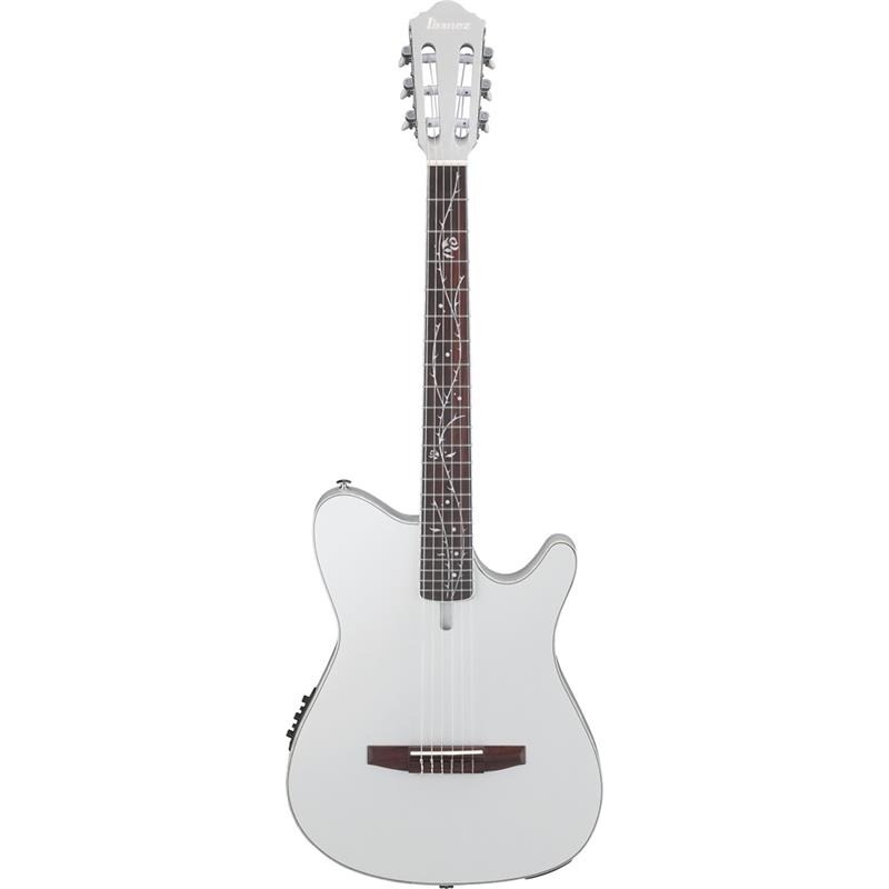 ■商品紹介Tim Hensonモデル新製品！2026年8月末頃順次入荷予定！・ギター・インスト・ジャンルをけん引し続けるバンド：Polyphiaのギタリスト、Tim Hensonモデル！・新色パール?ピンクとシルバー?メタリック（いずれも艶消し）に合わせてクローム?カラーのメタル?パーツを採用・サイド?ポート（側面孔）を装備したFRシェイプ?ホロウ?ボディ（w/ファン?ブレーシング）シングルカットのIbanezオリジナルFRシェイプを基に、クラシック・ギターでは一般的なファン・ブレーシングをトップ（表甲）に備えた厚さ約50mmのホロウ構造ボディです。ボディ表側にサウンド・ホールは有りませんが、プレイヤー側のボディ・サイドにサウンド・ポートを装備しています。エレキ・ギターと比べて大きく差のない構え心地で且つナチュラルなナイロン・サウンドを体感しやすい設計です。。・46mm幅ナット / 400mmR指板ナット幅は一般的なクラシック・ギターとエレキ・ギターの中間、指板には400mmのRを付けています。Timのようなエレクトリック・ギター・プレイヤーの演奏を想定し、スムーズなフィンガリングを実現するためにクラシック・ギターとは一線を画すスペックとしました。また、ナイロン・エレクトリック・ギターという新しいカテゴリを拓く本機は、バズ音すら厭わない（一般的なクラシック・ギターと比べると）やや低めの弦高設定を選択しています。・Tree of Death指板インレイIbanezを象徴する指板インレイと対を成すかのようなネーミングとデザインは、Tim本人の発想で実現したTODモデルを象徴する特別なスペックです。・Fishman Sonicore ピックアップ & Ibanez AEQ210TF プリアンプ w/オンボード?チューナーピックアップはアコースティック・サウンドを素直に増幅するFishman S-COREを採用しています。※画像はサンプルです。製品の特性上木目は一本一本異なります。■仕様詳細Body Shape：FRH bodyTop：Solid Sitka SpruceBack & Sides：SapeleBracing：Fan Bracing for FRHNeck：C Shape / Nyatoh neck Fretboard：RosewoodBridge：RosewoodInlay：Tree of Death inlay Body Binding：Pearloid binding Tuning Machine：Chrome Classical tuners Nut Material：Bone Saddle Material：Bone Pickup：Fishman S-Core pickupPreamp：Ibanez AEQ210TF preamp w/Onboard tunerOutput Jack：1/4outputs1/4outputsNUT Width 46mmソフトケース付属検索キーワード：イケベカテゴリ_アコースティック・エレアコギター_エレガット_Ibanez_新品 SW_Ibanez_新品 JAN:4549763398970 登録日:2026/07/01 エレアコ アイバニーズ イバニーズ