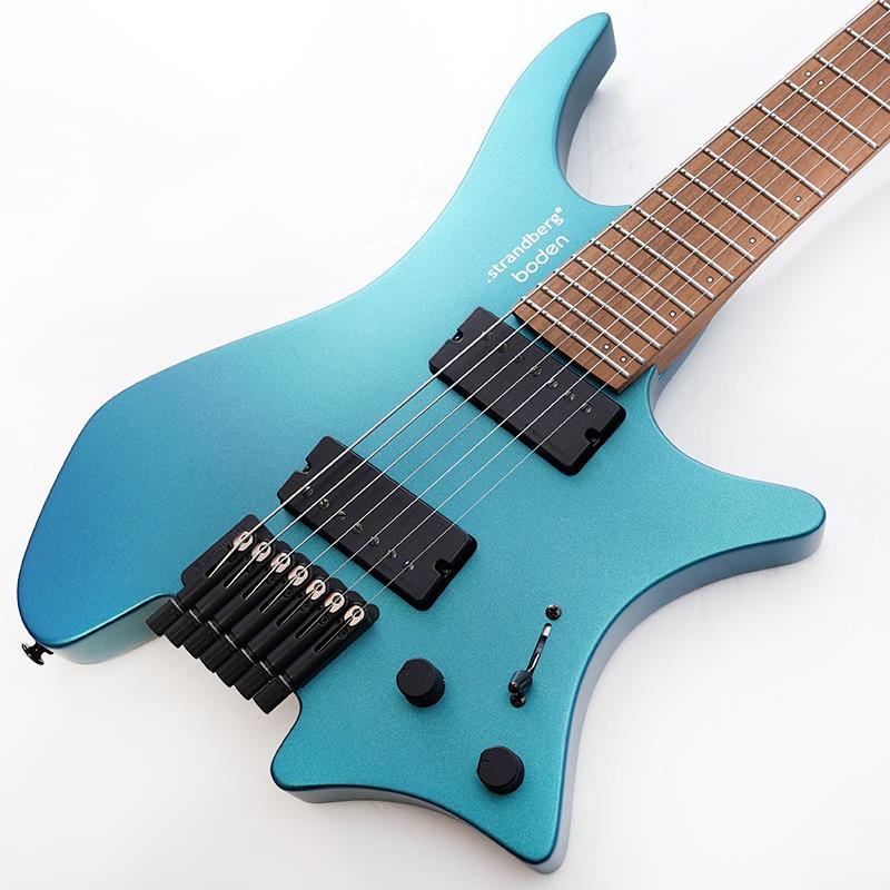 ■商品紹介新たなスタンダードを確立するStandard N2シリーズN2ビジョン.strandberg*では、演奏すればするほど成長できると信じています。この信念が、私たちの演奏を高め、より多く演奏する意欲を掻き立てるために設計された、これまでで最も大胆な進化形であるボーデンN2シリーズへと導きました。スタンダードN2の彫刻のように曲線を描くトップボディは、ギターがプレイヤーに合わせるのではなく、プレイヤーを中心に設計されています。弦の自然な弧に沿うことで、ピッキングハンドと前腕を支え、負担を軽減しながら長時間プレイを可能にします。その結果、単に体に寄り添うだけでなく、まるで自分の一部のように感じられるギターが誕生しました。堅牢なバスウッドボディとローストメイプルネックが温かみと深みを生み出し、EGSアークハードウェアがサステインとパンチを加えます。セイモアダンカンピックアップと組み合わせたボーデンスタンダードN2は、核となるパワーを保ちつつ幅広いトーンを提供します。革新的なEndurNeck設計をさらに進化させたStandard N2では、チタン補強ロッドを追加。これにより史上最強の.strandberg*ネックを実現し、安定性と耐久性が向上、より豊かなアコースティック共鳴を生み出します。スタンダードN2ギターの澄み渡り深みのあるトーンは、ダイナミクスと力強さの絶妙なバランスを備えたセイモアダンカン・センティエント／ペガサス・ハムバッカー・ピックアップによって捉えられています。クリアで明瞭でありながら、豊かで威厳に満ちた音色です。ボーデン・スタンダードN2は定評あるストランドバーグ*の人間工学設計と集中したソリッドボディ・トーンの最新バージョンを求める要求の厳しいプレイヤーに最適なモデルです。EGS ARCハードウェアの堅牢な性能と市場をリードするセイモアダンカン・ピックアップを組み合わせた、理想的な.strandberg*です。※画像はサンプルです。製品の特性上、杢目、色合いは個体ごとに異なります。ギグバッグ付属■仕様詳細GeneralNeck Construction:Bolt-OnBody Construction:SolidScale Configuration:Multi-ScaleNeck Profile:EndurNeckBridge Type:HardtailBodyBody Material:BasswoodBody Top Material:N/ABody Finish Type:Acrylic SatinNeckNeck Material:Roasted MapleNeck Reinforcement Material:Titanium， WalnutFretboard Material:Roasted MapleScale Length:25.5-26.25Fretboard Radius:20Number of Frets:24Zero Fret Type:DHP 27H17S Stainless SteelMain Fret Type:DHP 28HFS Stainless SteelNeutral Fret:10Nut Width Global:49.00 mmNut Width Imperial:1.93 inchFretboard Inlays:Original Luminlay Green with black pipingFretboard Side Dots:Original Luminlay Green with black pipingNeck Finish Type:Acrylic SatinNut:Plastic moulded 7-string nutTruss Rod:Double-Expanding Steel HargwareHardware Finish:Black SatinBridge:.strandberg* EGS ARC 7-string Multiscale Hardtail BridgeString Lock:.strandberg* EGS ARC 7-string String LockKnobs:Aluminum Knob NX 6mm hole knurled BlackElectronicsPickup Configuration:H-HElectronics Type:PassiveBridge Pickup:Seymour Duncan 7-string Pegasus Angled BlackNeck Pickup:Seymour Duncan 7-string Sentient Angled BlackControl Set:Master Volume， Master Tone， 5-Way Pickup SelectorPickup Switching:1. Bridge Humbucking， 2. Bridge Humbucking + Neck Outer Coil， 3. Bridge Humbucking + Neck Outer Coil in series with Neck Inner Coil， 4. Neck Inner Coil， 5. Neck HumbuckingMiscellaneousFactory Strings:D’Addario NYXL 9.5-64 with tapered low BFactory Tuning:BEADGBE検索キーワード：イケベカテゴリ_エレキギター_ヘッドレスタイプ_Strandberg_Boden Standard_新品 SW_Strandberg_新品 JAN:0819052025929 登録日:2025/11/28 ストランドバーグ ボーデン エレキギター