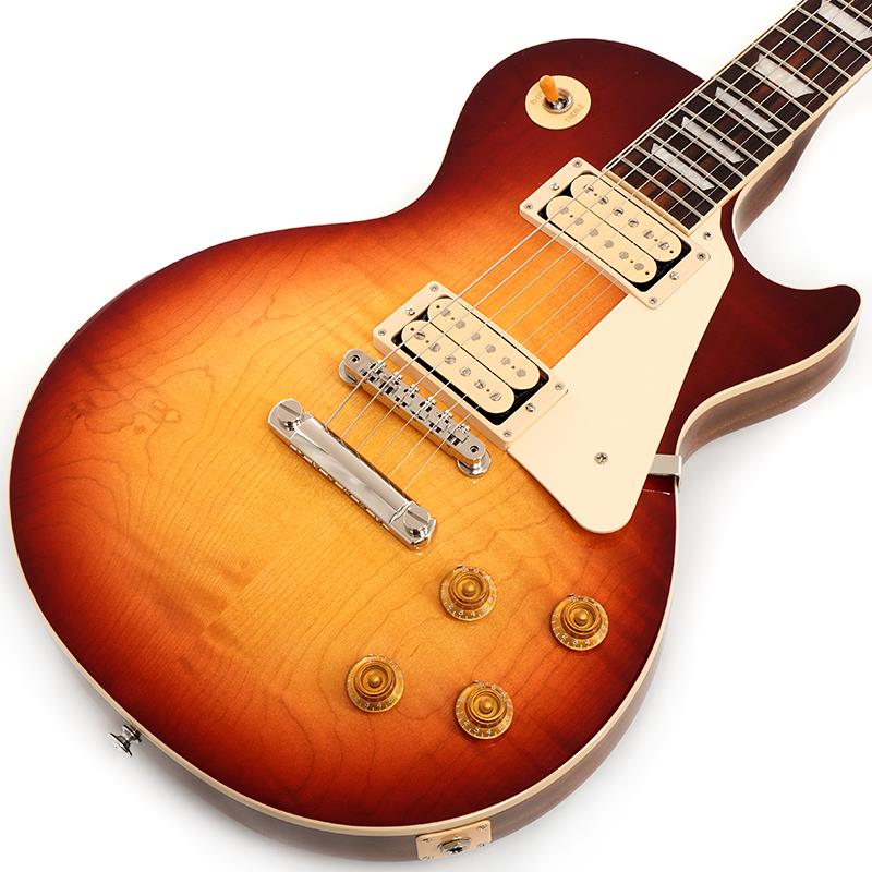 ■商品紹介Les Paul Standard '50s Double TroubleLes Paul Standard '50s Double Troubleは、通常のLes Paul Standard 50sモデルと同様の機能と特徴をすべて備えながらも、さらなるヴィンテージの風格が吹き込まれた特別仕様モデルです。この限定生産となるレスポールは、通常のLes Paul Standard '50sモデルとは2つの点で異なります。本モデルにはピックアップ・カバー非装着（オープン・タイプ）のBurstbucker 1とBurstbucker 2ピックアップが2基搭載されており、それぞれにダブル・クラシック・ホワイトのボビンとBurstbucker標準のアルニコ2マグネットを採用しています。また、フィニッシュにも変更が加えられています。本モデルでは、標準のグロス・ニトロセルロース・ラッカー・フィニッシュのヴィンテージ・カラー・バリエーションを採用。グロス・ニトロセルロース・ラッカー・フィニッシュは1950年代の新品同様の仕上がりを再現していますが、Les Paul Standard 50s Double Troubleでは、わずかに色褪せたフルグロス・ニトロセルロース・ラッカーのヴィンテージ・カラー・フィニッシュを使用しており、年月を経て自然に生じる経年変化の風合いを再現しています。また、カラーはすべて手作業でスプレーされるため、バースト・パターンは個体ごとにわずかに異なります。このような特色が加えられながらも、Les Paul Standard 50sの広く愛される基本仕様に変更はなく、ウェイト・リリーフ無しのソリッド・マホガニーボディ、AAグレードのフィギュアド・メイプル・トップ、丸みのある50年代スタイルのマホガニー・ネック、ローズウッド指板、22フレット仕様のミディアムジャンボフレット、トラペゾイド・インレイを擁しています。また、ABR-1 Tune-O-Maticブリッジ、アルミ製ストップバー・テイルピース、キーストーンボタン仕様のVintage Deluxeチューナー、ダイヤルポインター付きのエイジド・ゴールド・トップハット・ノブを搭載。キャリブレート処理がされたオープン・タイプのBurstbucker 1 (ネック) とBurstbucker 2 (ブリッジ)は、ダブル・クラシック・ホワイト・ボビンであること以外は標準のBurstbuckerと同様の仕様となっています。手作業で製作され、アルニコ2マグネットを使用し、オーディオテーパーのポットとOrange Dropキャパシターが手作業により配線されています。ダブル・クラシック・ホワイトのボビンとヴィンテージ・フィニッシュの組み合わせにより、Les Paul Standard '50s Double Troubleは気品あるヴィンテージの風格を醸し出しながらも、手の届きやすい価格を実現しています。各カラー500本のみの限定生産となります。S/N 226150011Weight≒4.29kg■仕様詳細BodyMaterial: MahoganyTop: AA Figured MapleBinding: Cream; Top and FretboardNeckNeck: MahoganyProfile: 50s VintageNut width: 1.69/43.053mmFingerboard: RosewoodScale length: 24.75/628.65mmNumber of frets: 22Nut: Graph TechInlay: Acylic TrapezoidHardwareBridge: ABR-1 Tune-O-MaticTailpiece: Aluminum Stop BarTuners:Vintage Deluxe with Keystone ButtonPlating: NickelElectronicsNeck pickup: Burstbucker 1， Double Classic White BobbinsBridge pickup: Burstbucker 2， Double Classic White BobbinsControls: 2 Volume， 2 Tone; Hand-wired with Orange Drop Capacitorsハードケース付属検索キーワード：イケベカテゴリ_エレキギター_レスポールタイプ_Gibson_Les Paul Models_新品 SW_Gibson_新品 JAN:4570156012975 登録日:2025/12/14 エレキギター ギブソン レスポール