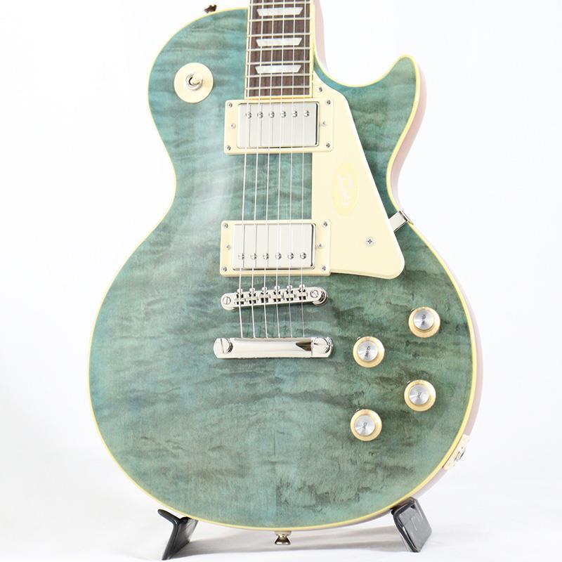 ■商品紹介新品チョイキズ超特価！海外ディーラー向けに生産されたExclusive Modelが入荷！！Inspired by Gibson OriginalInspired by Gibsonコレクションから新たにリリースされたEpiphone Les Paul Standard 60sは、60年代初頭のLes Paulを想起させるサウンド・ルックス・フィーリングを現代に蘇らせています。ボディ・トップにはメイプルが貼られ、杢目を際立たせるトランスルーセント系カラーにはAAA グレードのキルト・メイプル化粧板がトップにあしらわれ、往年のキルト・トップの外観を醸し出しています。ローレル指板上ではパーロイド素材のディッシュ・インレイが施され、ミディアム・ジャンボ・フレットを採用。60s SlimTaperプロファイルのネックシェイプはスムーズな演奏性に寄与し、ヘッド部に装着されたGrover RotomaticチューナーとGraph Techナットは安定したチューニングをもたらします。Epiphoneの定評ある2基のProbuckerピックアップを採用し、ネック・ポジションにはProbucker 2を、ブリッジ・ポジションには出力が高めに調整されたProbucker 3を搭載。それぞれのピックアップは一対となるCTSボリューム＆トーン・コントロールに接続されています。魅力的で多様なカラー・バリエーションをラインアップし、プレミアム・ギグバッグが付属となります。※画像はサンプルです。製品の特性上、杢目、色合いは個体ごとに異なります。■仕様詳細BodyBody Material: Okoume (Gaboon Mahogany) or Sapelli (Sapelli Mahogany)Body Top: Maple; with AAA Flame Maple Veneer on Translucent FinishesBinding: Single Ply， Top and FretboardBody Finish: GlossNeckNeck Material: MahoganyFingerboard Material: LaurelProfile: SlimTaper 60s CScale Length: 628.65 mm / 24.75 inFingerboard Radius: 304.8 mm / 12 inFret Count: 22Frets: Medium JumboNut Material: Graph TechNut Width: 43.0 mm / 1.692 inInlays: Pearloid TrapezoidJoint: Glued In， Set NeckHardwareFinish: NickelBridge: LockTone Tune-O-MaticTailpiece: LockTone Stop BarTuning Machines: Grover Rotomatic with Kidney ButtonElectronicsNeck Pickup: Probucker 2Bridge Pickup: Probucker 3Controls: 2 Volume， 2 Tone; CTS PotentiometersPickup Selector: 3-way Epiphone ToggleOutput Jack: 1/4ギグバッグ付属検索キーワード：イケベカテゴリ_エレキギター_レスポールタイプ_Epiphone_レスポール_アウトレット SW_Epiphone_アウトレット JAN:4570156011985 登録日:2025/11/16 エレキギター エピフォン レスポール