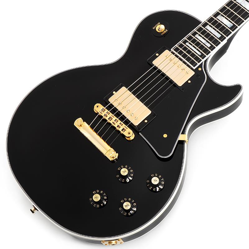 ■商品紹介ついにLes Paul Customが待望の復活！Les Paul Customは、Les Paulモデルのハイグレードモデルとして1953年に初めて発表されました。このモデルは、Les Paul本人のリクエストによるもので、タキシードのようなルックスをしたLes Paulギターのブラックバージョンを希望していました。1961年、後にSG Customとして知られることになる新しいダブルカッタウェイモデルの登場に伴い、シングルカッタウェイのLes Paul Customは生産終了となり、1968年にオリジナルのシングルカッタウェイモデルが再発表されました。1970年代にはLes Paul Customの生産がカラマズーからナッシュビルに移り、Les Paul Customはオリジナルのオールマホガニーボディ構造をマルチピースメイプルトップに変更し、新しくメイプルネックを採用するなど、モデルをさらに洗練させる様々な仕様変更が行われました。今日、これらの70年代のLes Paul Customは、ヴィンテージ市場で最も急速に値上がりしているギターの1つです。レスポール・カスタムをギブソン・カスタム・ショップのみで提供してきた20年を経て、ギブソンは誇りを持ってレスポール・カスタム70sを発表します。マホガニー・ボディに3ピース・メイプル・トップという、1970年代のクラシックなスペックを踏襲しています。ボディは5プライ・トップ・バインディングと3プライ・バック・バインディングで装飾されています。メイプル・ネックは70年代のプロファイルとボリュートを備え、22本のミディアム・ジャンボ・フレットとマザー・オブ・パールのブロック・インレイを備えたバインディング・エボニー指板が採用されています。ヘッドストックにも、レスポール・カスタムの代名詞となっている、ギブソン・スーパー400に由来した有名なカスタム・スプリット・ダイヤモンド・マザー・オブ・パール・ヘッドストック・インレイが施されています。Les Paul Custom 70sは、アルミ製ナッシュビル・チューン・オー・マチック・ブリッジ、アルミ製ストップ・バー・テイルピース、そして信頼性の高いチューニングの安定性を実現する、スムーズな回転のキーストーン・ボタン・チューナーを備えたGrover Rotomaticなどのゴールド・ハードウェアを備えています。Posi-Lokストラップ・ロック、5-Plyピックガード、Witch Hatコントロール・ノブなど、70年代の仕様が細部に至るまで再現されています。エレクトロニクスも当時にふさわしいもので、Calibrated T-Typeハムバッカーを2つ搭載し、それぞれのボリュームとトーン・コントロールはOrange Dropコンデンサーを使用し、ハンドワイヤリングで配線されています。Les Paul Custom 70sは、エボニー、タバコ・バースト、ワイン・レッド、そして美しいバタークリーム・トップを含む4種類のグロス・ニトロセルロース・ラッカー・フィニッシュで展開され、保管や持ち歩きに適したハードシェル・ケースが付属します。ついにLes Paul Customがギブソン USA のラインナップに待望の復活を果たし、あなたの世界を揺さぶる準備が整いました。S/N 231150009Weight≒4.92kg■仕様詳細BodyShape: Les PaulMaterial: MahoganyTop: MapleBinding: Multi-ply Top， Back， and Headstock， Single Ply FretboardNeckNeck: MapleProfile: 70s， With VoluteNut width: 1.695 / 43.053mmFingerboard: EbonyScale length: 24.75 / 628.65mmNumber of frets: 22Nut: Graph TechInlay: Mother of Pearl BlockHardwareBridge: Aluminum Nashville Tune-O-MaticTailpiece: Aluminum Stop BarTuners: Grover Rotomatic with Key stone ButtonPlating: GoldElectronicsNeck pickup: Calibrated T-Type NeckBridge pickup: Calibrated T-Type BridgeControls: 2 Volume， 2 Tone; Hand-wired with Orange Drop CapacitorsOtherCase: Hardshel検索キーワード：イケベカテゴリ_エレキギター_レスポールタイプ_Gibson_Les Paul Models_新品 SW_Gibson_新品 JAN:4570156008848 登録日:2026/03/16 エレキギター ギブソン レスポール