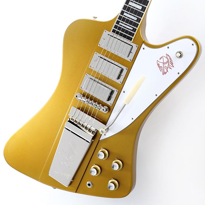 ■商品紹介「ダブル・ゴールド」で再構築された、1963年製Firebird VIIリイシューの限定モデルギブソン・カスタムの「リミテッド・エディション・コレクション」の一環として登場した「1963 Firebird VII Reissue（グロス仕上げ、ダブル・ゴールド）」は、1960年代のギブソンのクラフトマンシップから生まれた、最も独創的かつ先進的なデザインの一つを称えるモデルです。長年にわたる「Made to Measure（カスタムオーダー）」での製作実績や、テネシー州ナッシュビルのギブソン・カスタム・ショップの職人たちの芸術性にインスピレーションを得た本モデルは、大胆なデザイン、流麗なボディ・ライン、そして最先端の電装系が融合し、エレクトリック・ギターのあり方を再定義した時代を現代に蘇らせます。緻密に作り込まれたこのリイシュー・モデルは、1963年製Firebird VIIのオリジナリティを尊重しつつ、歴史的な正確さと現代的な構造を重視するプレイヤーのために、その外観をより魅力的なものへと昇華させています。ボディには伝統的なマホガニー・ウィングを採用し、グロス・ニトロセルロース・ラッカーで仕上げることで、「ダブル・ゴールド」カラーの深みを際立たせるとともに、楽器本来の鳴りを最大限に引き出しています。オリジナル同様、マホガニーとウォルナットを組み合わせた9プライ構造のネック・スルー・ボディを採用し、驚異的なサステインと安定性を実現しました。ネック・プロファイルには「Authentic 1963 Firebird」を採用し、しっかりとした握り心地と快適な演奏性を両立。指板にはエボニーを使用し、歯切れの良いアタック感と明瞭なトーン、そして高級感のある演奏フィールを提供します。リイシュー・ミディアム・ジャンボ・フレット、マザー・オブ・パール（真珠貝）のブロック・インレイ、シングル・プライの指板バインディング、そして24.75インチ・スケールといった仕様が、歴史に忠実なディテールを完成させています。3基のFirebirdミニ・ハムバッカー・ピックアップが、初期のリバース・ボディ・モデルを象徴する、明瞭かつ鋭く、ダイナミックなサウンドを奏でます。明るく芯のあるトーンを特徴とし、クリスタルのように澄んだクリーン・トーンからアグレッシブなオーバードライブ・サウンドまで幅広く対応。ピッキングのニュアンスに即座に反応するレスポンスの良さも魅力です。2ボリューム、2トーン、3ウェイ・トグル・スイッチという伝統的なコントロール・レイアウトにより、楽器が持つ幅広いトーン・レンジを直感的に操ることができます。より豊かな表現力と洗練されたピッチ・モジュレーションを求めるプレイヤーのために、オリジナルFirebird VIIに不可欠な要素であった「Maestro Vibrola（マエストロ・ビブラート）」テイルピースを搭載しました。ABR-1 Tune-O-Maticブリッジやニッケル・ハードウェアとの組み合わせにより、ルックスと演奏性の両面において、この楽器にさらなるスタイルと表現力をもたらしています。シルバー・インサートをあしらったゴールドのトップハット・ノブや、Firebird特有の「バンジョー・スタイル」プラネタリー・チューナーが、当時の仕様を忠実に再現したルックスを完成させています。各「1963 Firebird VII Reissue」には、Liftonリイシュー・ハードシェル・ケースと認定証が付属し、Gibson Customならではの卓越したクラフトマンシップと細部へのこだわりが反映されています。大胆かつアイコニック、そして紛れもない気品を漂わせるこの限定モデルは、Gibsonの最も革新的なデザインの一つであるFirebirdが持つ、不朽のレガシーを際立たせています。3Weight≒4.32kgハードケース付属■仕様詳細BodyBody Shape: FirebirdBody Material: Mahogany wingsWeight Relief: NoneFinish: Gloss nitrocellulose lacquerNeckNeck Material: 5-piece maple and walnutProfile: Authentic 1963Scale Length: 24.75 / 628.65mmFingerboard Material: EbonyFingerboard Radius: 12Number Of Frets: 22Frets: Reissue Medium JumboNut Material: NylonInlays: BlockJoint: Neck-Through ConstructionHardwareFinish: NickelTuner Plating: NickelBridge: ABR-1 Tune-O-MaticTailpiece: Maestro VibrolaTuning Machines: Banjo-style FirebirdControl Knobs: Gold Top Hats with silver insertsElectronicsNeck Pickup: Firebird Middle Pickup: Firebird Bridge Pickup: Firebird Controls: 2 volume， 2 tonePickup Selector :3-way toggle検索キーワード：イケベカテゴリ_エレキギター_ファイヤーバードタイプ_Gibson_Custom Shop_新品 SW_Gibson_新品 JAN:4570156026293 登録日:2026/08/10 エレキギター ギブソン カスタムショップ