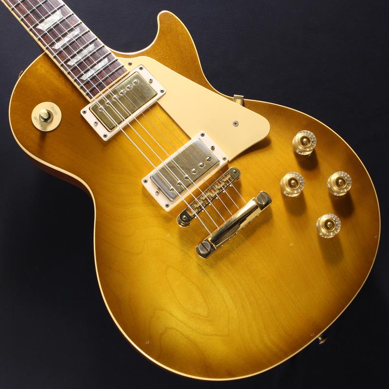 ■商品紹介◆イケベリユース認定中古楽器保証書(ご購入日から12ヶ月有効)付属◆1998年製、レスポールスタンダードの中古品が入荷！こちらはレアなゴールドハードウェアを搭載したLes Paul Standard。メイプルトップ＆マホガニーバックのボディとセットネック構造の組み合わせにより、太く厚みのある中域と歯切れの良いレスポンスを併せ持った往年のレスポールトーンを出力。オリジナルピックアップの 490R（Rhythm）と498T（Treble）はハイゲインなドライブサウンドから甘く艶やかなクリーンまで幅広く得意とし、ジャンルやスタイルを問わずお使い頂ける王道の逸品と言えるでしょう！当個体のコンデションとしましては、傷や打痕、塗装欠けやゴールドパーツのくすみ、指板上に軽微な打痕等年代相応に使用感がございます。フレットは残り8〜9割程、電装系やトラスロッドの動作にも問題無くプレイヤーズコンディションの1本です。1998年製Epiphoneソフトケース付属重量：約4.22kg■仕様詳細Body: Carved Maple Top MahoganyNeck: MahoganyFingerboard/Inlay: Rosewood， 22 Frets/TrapezoidBridge/Tailpece: Tune-o-matic/Stop BarPickups: 490R (Front)， 498T (Rear)Controls: 2 Volume， 2 Tone， 3Way Switch検索キーワード：イケベカテゴリ_エレキギター_レスポールタイプ_Gibson_Les Paul Models_ユーズド SW_Gibson_ユーズド JAN:2500010897884 登録日:2026/07/04 エレキギター ギブソン レスポール