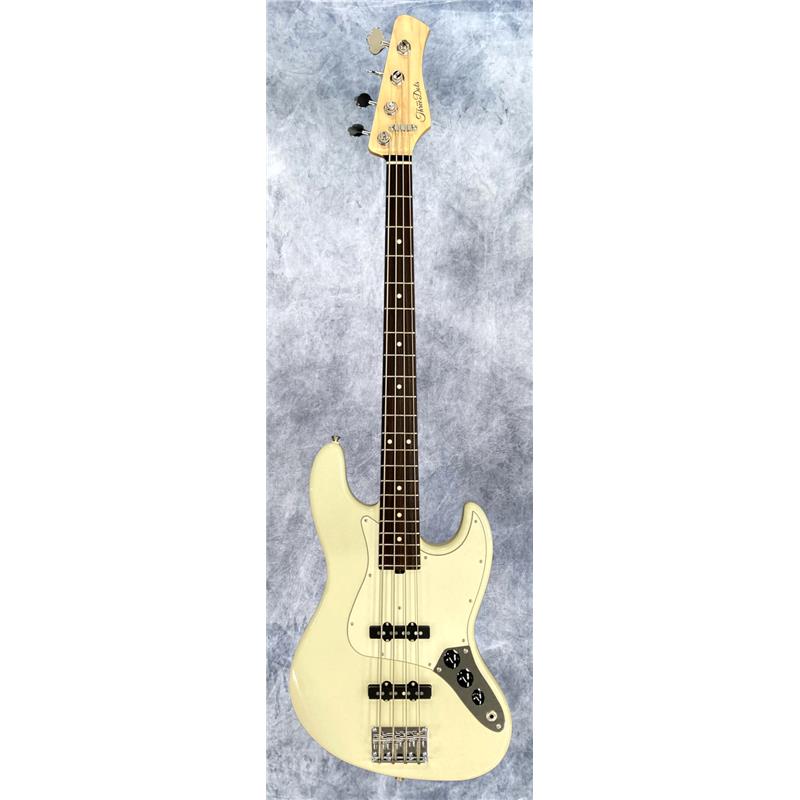 ■商品紹介【数量限定大特価】商品入れ替えにつき、数量限定超特価にてご提供！「現場でヴィンテージに引けを取らないサウンド」のJB、リニューアルバージョン！お店で手に取った楽器がプロの現場でそのまま使える演奏性と信頼性、そして、その楽器を手の届きやすい価格で提供するという、コンセプトを掲げ立ち上げられた「スリードッツギターズ」のベース。工房に深く関わるベーシスト、Tak斉藤氏と日本を代表するルシアー菊地嘉幸氏の監修により完成したハイコストパフォーマンスモデル。ヘッド形状は「Kikuchi Guitars」のデザインを採用。トラディショナルなJBスタイルを継承しつつも、菊地氏が培ってきた技術、センスを注ぎ込み「コストは抑えつつも、プロの現場で使えるモデル」を実現したモデルに仕上がっています。小振りなディンキーシェイプをわずかにサイズアップしつつも、フルサイズよりは若干小さいという「丁度良い」を体現したボディに、グリップ/指板アールともにスタンダードながらも、現代的なプレイスタイルに対応する為にローアングル弦高に設定されたネック、タイトさを保ちつつも重量やサスティンを考慮したパーツ類など、トラディショナルなスタイルを継承しつつ現代的な扱いやすさも共存するスペックを採用。これらはTak斉藤氏所有のヴィンテージJBとの徹底的な比較を重ね、「現場でヴィンテージに引けを取らないサウンド」をテーマに選定/制作されました。何よりも大きな特徴は、このモデルの為に制作されたピックアップ。 Tak斉藤氏と菊地氏による数十回に及ぶ試作〜試奏を重ね完成したこだわりのパーツとなります。楽器そのもののサウンドをしっかり再生しつつ、抜けの良いアタック感やアンサンブルに埋もれない線の太い存在感、更にローノイズを実現、シンプルなスペックの中においても、大きなインパクトを放ちます。ハイクオリティなセットアップは、プレイヤビリティ面においても、言わずもがなの圧倒的なストレスの無さ、イントネーションの良さを誇っています。奇をてらったユニークな仕様ではなく、シンプルなパッシブスタイルJBからのスタートという点に、ブランドの強いこだわりを感じさせます。一般的なヴィンテージリイシュとは一線を画す太いサウンドが、プレイヤー向けの実践的なモデルとして既に大きな存在感を放つブランド/モデルとなっています。世界に誇る国産モデルのクオリティを是非ご体験ください。Three Dots、三つのドットの由来・playability=優れた演奏性・reliability=信頼性・affordability=値頃感※保証書は付属いたしません（初期不良対応のみ）※画像はサンプルです。材質の特性上、木目/色合いは一本ごとに異なります。■仕様詳細Body Wood：Alder 2-PieceBody Shape：JBNeck Wood：Maple（carbon fiber rod）Fingerboard Wood：RosewoodScale：864mmRadius：305RFret：DHP24HNut Width：38mmFinish：PolyesterTuner：HipshotPickup：Original JControl：Volume/Volume/ToneBridge：Vintage style 20mmString Gauge：045-105Color：OWH(Olympic White)ギグバッグ付属検索キーワード：イケベカテゴリ_ベース_エレキベース_JBタイプ_Three Dots Guitars_アウトレット SW_Three Dots Guitars_アウトレット JAN:4571220085444 登録日:2026/02/12 エレキベース スリードット 3Dot 3Dots スリードッツ