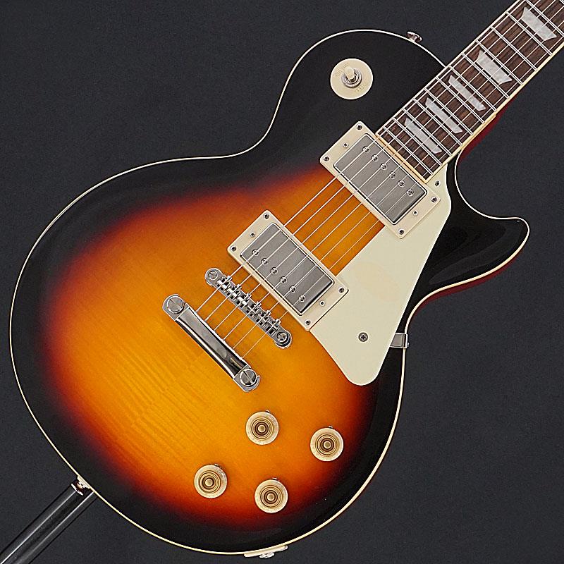 ■商品紹介ギブソン直系のルックスと仕様を受け継ぎ世界中にユーザーを持つエピフォン。渋みのあるバーボンバーストを纏った美品中古の入荷！Epiphone Les Paul Standard '50sは、EpiphoneInspired by Gibsonコレクションを代表する1本です。1950年代製のレスポールのフィーリングとトーンが見事なまでに再現されています。エピフォンとレス・ポール氏の長い友情関係は1940年にまで遡ります。若きレス・ポール氏は、当時マンハッタンにあったエピフォン工房で夜な夜な試作を重ね、世界初のソリッドボディ・エレクトリックギターのひとつと言われるthe Logを作り上げました。そしてthe Logでの成果が後々、今日も多くのギタープレイヤーにとって最上のエレクトリックギターとして垂涎の的である、レスポール・モデルの開発・誕生へと反映されていったのです。ボディ・トップにはメイプルが貼られ、上面にはAAA グレードのフレイム・メイプル化粧板があしらわれています。1959ラウンド・ミディアム・Cシェイプのネックにはバインディングが巻かれロング・ネック・テノン方式でボディにジョイントされています。ローレル指板にはクラシカルなディッシュ・インレイが施され、22フレット仕様のミディアム・ジャンボ・フレットを採用。カラマズー・ヘッドストックにはヴィンテージ・デラックス・チューナーを搭載し、電装系には定評ある2基のProbuckerハムバッカー・ピックアップ、ダイヤル・ポインタ付きのゴールド・トップハット・ノブを採用。Graph Techナット、CTSポット、往時の製法に則った配線など、拘りの仕様群により魅力が一層高められています。個体状態といたしましては、少量の細かなキズやパーツのくすみ、ピックガード上のステッカー痕が生じておりますが、美観を損なう深いキズはなく概ね美品コンディションといえるでしょう。フレットも8割程度の高さを残し、ネックコンディションや電装系含め演奏面での支障はございませんので、これからも末永くお付き合いいただける1本としてお迎えいただけます。エレキギターの大定番モデルとなるレスポール、ぜひともこの機会にご検討ください！2023年製Epiphone製ソフトケース付属Weight≒4.09kg■仕様詳細Body.....Carved Hard Maple Cap with AAA Flame Maple Veneer， Okoume (Gaboon Mahogany) or Sapelli (Sapelli Mahogany) BackNeck.....Mahogany， 59 Rounded Medium CFingerboard.....Laurel， 12Frets.....22， Medium JumboNut.....Graph Tech， 1.692Scale.....24.75Tuners.....Epiphone Vintage Deluxe Bridge.....LockTone Tune-O-Matic & Stopbar TailpieceHardware.....NickelPickups.....Epiphone ProBucker-1 (Neck)， ProBucker-2 (Bridge)Controls.....2Volume， 2Tone， 3way Toggle SW検索キーワード：イケベカテゴリ_エレキギター_レスポールタイプ_Epiphone_レスポール_ユーズド SW_Epiphone_ユーズド JAN:2500010833639 登録日:2026/01/31 エレキギター エピフォン レスポール