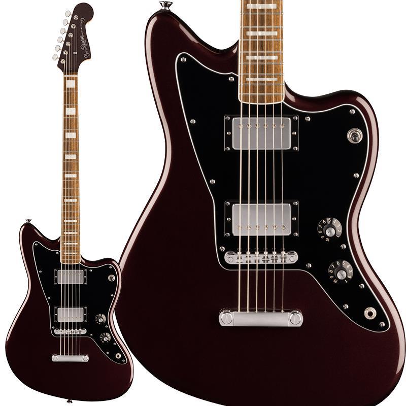 ■商品紹介Paranormal Baritone JazzmasterParanormal Baritone Jazzmaster HHは、アイコニックなオフセットデザインのギターを未踏のローエンド領域へと押し広げるモデルです。Jazzmasterボディに27インチのバリトンスケールを組み合わせ、Fenderデザインのアルニコハムバッカーを2基搭載することで、圧倒的な存在感を持つ重厚で迫力あるトーンを実現します。バリトン弦セットと、Adjust-O-Maticブリッジとストップバーテイルピースによって高いイントネーション精度と豊かなサステインを確保。ヘヴィなリフからシネマティックなサウンドスケープまで、幅広い表現力を発揮します。3ウェイトグルスイッチにより、ブリッジ、ミックス、ネックの各ハムバッカーサウンドを切り替え可能で、ローチューニングでも柔軟な音作りが行えます。その他、スリムで快適なCシェイプネック、バインディングを施したインディアンローレル指板とパーロイドブロックインレイ、サテンウレタン仕上げのネックによる滑らかな演奏性、そしてヴィンテージスタイルチューナーによる安定したチューニングといった特徴を備えています。※画像はサンプルです。製品の特性上、杢目、色合は個体ごとに異なります。ソフトケース付属■仕様詳細Body Material: NyatohBody Finish: Gloss PolyesterNeck: Maple， C ShapeNeck Finish:Gloss PolyurethaneFingerboard: Indian Laurel， 9.5 (241 mm)Frets: 22， Narrow TallPosition Inlays: Pearl Block (Indian Laurel)Nut (Material/Width): Micarta， 1.650 (42 mm)Tuning Machines: Vintage StyleScale Length: 27 (686 mm)Bridge: Tune-O-MaticPickguard: 3-Ply BlackPickups: Fender Designed Alnico Humbucking (Bridge)， (Middle)， Fender Designed Alnico Humbucking (Neck)Pickup Switching: 3-Position Blade:Position 1. Bridge Pickup，Position 2. Middle Pickup，Position 3. NeckPickupControls: Master Volume， Master ToneControl Knobs: Skirted Amp KnobsHardware Finish: ChromeStrings: Nickel Plated Steel (.014-.068 Gauges)検索キーワード：イケベカテゴリ_エレキギター_ジャズマスタータイプ・JMタイプ_Squier by Fender_Jazzmaster_新品 SW_Squier by Fender_新品 JAN:0197955143422 登録日:2026/09/02 エレキギター スクワイヤー スクワイアー フェンダー ジャズマスター ジャズマス