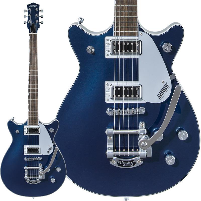 ■商品紹介Electromatic SeriesG5232T Electromatic Double Jet FT with Bigsby は、Jetならではの卓越したパワーとサウンドを提供します。ダブルカッタウェイのチェンバードマホガニーボディとアーチドメイプルトップのトーンウッドコンビネーションにより、豊かなローエンドとミッドレンジ、そして明確かつシルキーなハイエンドに特徴付けられる、ラウドでクリアなクラシックJetトーンが得られます。このサウンドこそが、多種多様なトーンにも対応する、力強くバランスの取れたサウンドの基礎を形成します。Black Top Filter'Tronピックアップは、Electromatic Double Jet FTのチェンバードボディサウンドを増幅し、スケール感のある、バランスの取れたクリアなトーンを生み出します。ラウドでパンチの効いたサウンドは、あらゆるゲインレベルで輪郭を失わず、明瞭なトーンを維持します。3ポジショントグルスイッチで切り替えられるの2基のピックアップは、ボリュームコントロール、マスタートーン、マスターボリュームとトレブルブリード回路の組み合わせにより、ピックアップとトーンの設定を直感的かつ包括的にコントロールすることが可能です。12インチラジアスのローレル指板には22本のミディアムジャンボフレットとパーロイドNeo-Classicサムネイルインレイを採用し、ブリッジ部には固定式Adjusto-MaticブリッジとBigsby Tremoloを装備しています。※画像はサンプルです。製品の特性上、杢目、色合いは個体ごとに異なります。■仕様詳細Series: ElectromaticBody Material: Mahogany with Arched Maple TopBody Finish: GlossNeck: Mahogany， Thin UNeck Finish: GlossFingerboard: Laurel， 12 (305 mm)Frets: 22， Medium JumboPosition Inlays: Pearloid Neo-Classic ThumbnailNut (Material/Width): Synthetic Bone， 1.6875 (42.86 mm)Tuning Machines: Sealed Die-CastScale Length: 24.6 (625 mm)Bridge: Anchored Adjusto-MaticPickguard: Gold or Silver Plexi w/ Black Gretsch & Electromatic LogosPickups: Black Top Filter’Tron (Bridge & Neck)Pickup Switching: 3-Position Toggle:Position 1. Bridge PickupPosition 2. Bridge And Neck PickupsPosition 3. Neck PickupControls: Volume 1. (Neck Pickup)， Volume 2. (Bridge Pickup)， Master Volume， Master ToneControl Knobs: G-ArrowHardware Finish: ChromeStrings: Nickel Plated Steel (.010-.046 Gauges)ギグバッグ付属検索キーワード：イケベカテゴリ_エレキギター_その他_GRETSCH_Jet_新品 SW_GRETSCH_新品 JAN:0885978271535 登録日:2026/09/04 エレキギター グレッチ ジェット