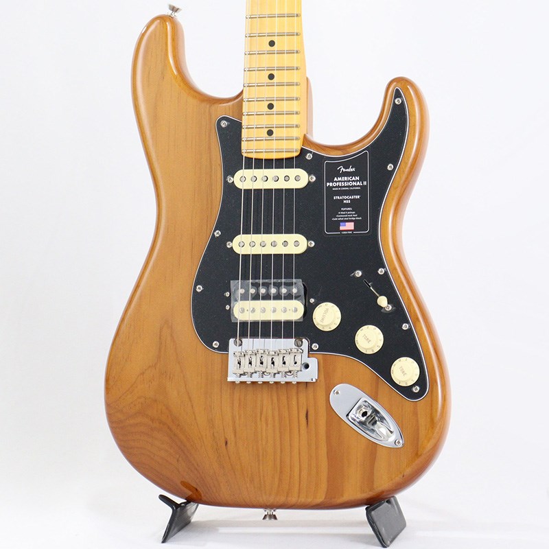 ■商品紹介American Professional II Stratocaster HSSは、60年以上に渡る革新、インスピレーション、進化を経て、現代のプレイヤーの要求に応えます。高い人気を誇るDeep Cシェイプネックは、丁寧にエッジがロールオフされ、至高の演奏体験を約束するSuper-Naturalサテン仕上げが施されています。また新たに設計されたネックヒールを採用し、快適なフィーリングとハイポジションへの容易なアクセスを実現しました。新しいV-Mod II Stratocaster Single-Coilピックアップは、ベルのような輝きとウォームさを両立し、これまで以上に繊細で魅力的なサウンドを実現しています。Double Tapブリッジピックアップはパンチのあるトーンと、Push-Push式コントロールによりバランスの取れたシングルコイルトーンに瞬時に切り替え可能です。コールドロールド（冷間圧延成型式）スチールブロックを採用した2点支持トレモロは、サスティン、明瞭度、ハイエンドの煌びやかさを向上させています。American Professional II Stratocaster HSSの手に馴染む感覚とサウンドの多様性は、手に取り、耳にした瞬間、すぐにお分かりいただけることでしょう。プロの楽器の新たなスタンダードとなるような幅広い改良が、American Professional IIシリーズには詰め込まれています。※画像はサンプルとなります。製品の特性上、杢目・色合いは1本1本異なります。■仕様詳細Series: American Professional IIBody Material: Alder， Roasted Pine (Sienna Sunburst， Roasted Pine)Body Finish: Gloss UrethaneNeck: Maple， Deep CNeck Finish: Super-Natural Satin Urethane Finish on Back of Neckwith Gloss Urethane Headstock FaceFingerboard: Maple - 9.5 (241 mm) RadiusFrets: 22， Narrow TallPosition Inlays: White DotNut (Material/Width): Bone， 1.685 (42.8 mm)Tuning Machines: Fender Standard Cast/Sealed StaggeredScale Length: 25.5 (648 mm)Bridge: 2-Point Synchronized Tremolo with Bent Steel Saddles， Pop-In TremoloArm and Cold-Rolled Steel BlockPickguard:3-Ply BlackPickups: V-Mod II Double Tap Humbucking (Bridge)， V-Mod II Single-Coil Strat(Middle， Neck)Pickup Switching:5-Position Blade: Position 1. Bridge Pickup Position 2. Bridge and MiddlePickup Position 3. Middle Pickup Position 4. Middle and Neck Pickup Position5. Neck PickupControls: Master Volume， Tone 1. (Neck/Middle Pickups)，Tone 2. (Bridge Pickup)Auxilliary Switching: Push-Push Tone Control Activates DoubleTap FunctionControl Knobs: Aged White PlasticHardware Finish: Nickel/ChromeStrings: Fender USA 250L Nickel Plated Steel (.009-.042 Gauges)ハードケース付属検索キーワード：イケベカテゴリ_エレキギター_STタイプ_Fender USA_American Professional II_新品 SW_Fender USA_新品 JAN:0885978578856 登録日:2021/02/07 エレキギター フェンダー ふぇんだー フェンダーUSA アメリカンプロフェッショナル アメプロ