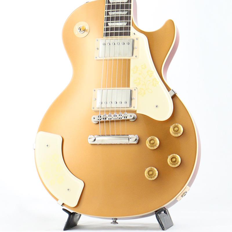 ■商品紹介Mary Ford Les Paul Standard1924年7月7日にアイリス・コリーン・サマーズとして生まれたメリー・フォードは、1950年代初頭の最も有名なレコーディングアーティストの一人であり、熟達したギタリスト、ボーカリスト、女優でした。カントリーミュージックでのキャリアとジーン・オートリーやエディ・ディーンとのつながりを通して、彼女はギブソンのアイコンであるレス・ポールとの音楽的パートナーシップを築き、1949年に結婚しました。1951年だけで、このデュオは600万枚以上のレコードを売り上げ、1950年から1954年にかけて、16曲のトップ10ヒットを録音しました。これらのヒットは、メリーの豊かで滑らかな声、多重トラック録音とオーバーダビング（当時としては画期的な録音技術）を通じて彼女自身と一緒に歌う複雑で完璧なハーモニー、そしてカントリー、ジャズ、ポップスをシームレスに融合する多彩なギター演奏を披露したものです。1951年、メリーとレスはカスタムオーダーでES-295ホローボディのデザインに影響を与え、メリーはそれをよく使用しました。 1958年、ES-295スタイルのフローラルピックガードとマッチしたアームレストを備えたLes Paul Goldtopモデルが、メリー・フォードのリクエストにより1本製作されたと考えられています。現在、ギブソンは、その唯一無二のオリジナルをベースにしたMary Ford Les Paul Standardをリリースできることを誇りに思っています。ゴールドトップフィニッシュは、ゴールドトップモデルとしては珍しいヴィンテージチェリーバックでアクセントが付けられています。クリームとゴールドのフローラルピックガードとアームレストに加えて、メイプルキャップ付きのマホガニーボディ、ローズウッド指板とSlimTaperプロファイルのマホガニーネックを特徴とし、ネックポジションにBurstbucker 2、ブリッジポジションにBurstbucker 3のペアのBurstbuckerピックアップを搭載しています。■仕様詳細Weight≒4.75kgBodyBody Material: MahoganyTop: MapleBinding: Single Ply; Top and FretboardBody Finish: Gloss Nitrocellulose LacquerWeight Relief: NoneNeckProfile: SlimTaperScale Length: 628.65 mm / 24.75 inFingerboard Material: Indian RosewoodFingerboard Radius: 304.8 mm / 12 inNeck Material: MahoganyFret Count: 22Frets: Medium JumboNut Material: Graph TechNut Width: 43.053 mm / 1.695 inEnd Of Board Width: 57.404 mm / 2.26 inInlays: Acrylic TrapezoidJoint: Glued In， Set NeckHardwareFinish: NickelBridge: ABR-1 Tune-O-MaticTailpiece: Aluminum Stop BarTuning Machines: Vintage Deluxe with Keystone ButtonPickguard: ES-295 Style， Cream with Gold Floral DesignControl Knobs: Gold Top Hat with Dial PointerElectronicsNeck Pickup: Burstbucker 2Bridge Pickup: Burstbucker 3Controls: 2 Volume， 2 Tone; Hand-wired with Orange Drop CapacitorsPickup Selector: 3-way ToggleOutput Jack: 1/4ハードケース付属検索キーワード：イケベカテゴリ_エレキギター_レスポールタイプ_Gibson_Les Paul Models_新品 SW_Gibson_新品 JAN:4570156004499 登録日:2025/12/09 エレキギター ギブソン レスポール