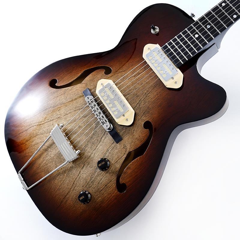 ■商品紹介5th Ave TL Vintage Burst HG Gold Foil 限定UTLET！GodinのMontrealシリーズと5th Aveシリーズを巧みに組み合わせたモデルです。このエレクトリックギターは、ミディアムサイズのフルホロウボディとカナディアンワイルドチェリーの材を使用しており、豊かなサスティーンとバランスの取れた暖かなサウンドを実現しています。高性能なLollar Gold Foil ピックアップを搭載し、ブルースからロック、ジャズまで、多岐にわたる音楽スタイルに対応できる表現力を持っています。カナダ産の木材であるカナディアンワイルドチェリーボディは軽量ながらも甘く、素直なサウンドをもち、シルバーリーフメイプルネックとの組み合わせで従来のアーチトップギターよりも低・中音域が豊かで、ダイナミックで豊かなトーンを奏でます。レスポンスに優れたクリアなサウンドのUSA Lollar Gold Foilを搭載し、表現力豊かなブルース、エネルギッシュなロック、洗練されたジャズまで、あらゆるスタイルに対応可能。クリームカラーのドッグイヤーとヴィンテージバーストカラーに上品なグロスフィニッシュが、モダンで上品な魅力を引き立てています。■仕様詳細[SPEC]Body.....Back and Sides/Canadian Wild Cherry，Top/Canadian Wild CherryNeck.....Silver Leaf MapleFingerboard.....EbonyFingerboard-radius.....16 (406.4 mm)Scale-length.....24.84 (630.936 mm)Nut-width.....43.688 mmNut-type.....GraphtechFrets.....21Fret Size.....MediumNeck&Bridge Pickup.....Lollar Gold FoilBridge-and-tailpiece.....Graphtech Adjustable Tusq Bridge (base) w/ T.O.M. With brass Saddles and trapeze tailpieceControls.....1x Tone， 1x Volume， 3-way ToggleColor.....Vintage BurstFinish.....High GlossNumbers of stringsString-set.....D'Addario EXL115 Nickel Wound汎用Gig Case付属検索キーワード：イケベカテゴリ_エレキギター_その他_Godin_アウトレット SW_Godin_アウトレット JAN:2500010864138 登録日:2026/03/24 エレキギター ゴダン