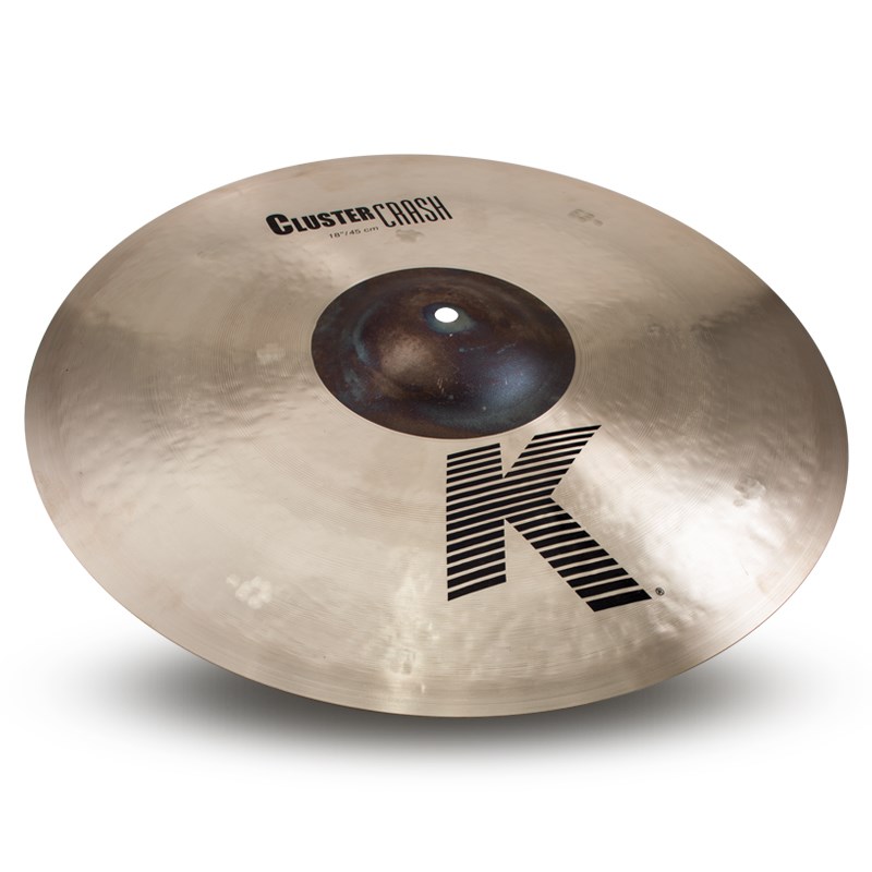 ■商品紹介【Dark Warm + Expressive 〜豊かな響きと表現力〜】K Zildjian19世紀のトルコでの誕生以来、世界中でドラマーの創造性をかきたて続けるシリーズ。入念なハンマリングとレイジング加工が幅広い音域でのハイとローの響きをブレンドする。優しくも、激しくも、その響きはアーティストの意のままに。＜Cluster Crash＞非常に薄いエクストラ・シンウェイトに設定された繊細な反応と響きを持つクラッシュ。トラディショナルKハンマリングに加え、コンサートシンバルや一部のコンスタンチノープルシリーズに採用されているクラスターハンマーテクニックを追加。サウンドホール加工を施すことなく程よく枯れたトラッシーなフィーリングを獲得しています。カップ部のレイジング（音溝）加工を施しておらず、余分なサスティンが抑制されることで耳馴染みよく高いプレイアビリティを発揮するクラッシュに仕上がっています。サイズ：18ウェイト：Paper Thin検索キーワード：イケベカテゴリ_ドラム_シンバル_クラッシュ_Zildjian_K Zildjian_新品 SW_Zildjian_新品 JAN:0642388322116 登録日:2019/03/17 シンバル ジルジャン Kジルジャン
