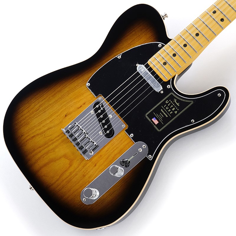 ■商品紹介Fender American Ultra Luxe SeriesAmerican Ultraはパフォーマンスとトーンの両方を極めたいプレイヤーのために作られた、最もモダンで先進的なシリーズです。今回、ステンレススチール製のフレットに、鮮明なカスタムカラーでマッチングされたヘッドストックを備えたAmerican Ultra Luxe Telecasterはまさにその進化系とも言えます。本モデルは、長時間にわたり演奏しても快適さを損なわない、ハイポジションへ容易にアクセスが可能なテーパードネックヒールに、丁寧なエッジ処理が施された特製のAugmented Dシェイプネックを採用しています。22本のステンレススチールミディアムジャンボフレットを備えた10-14インチコンパウンドラジアスの指板は、ストレス無くスピーディで正確なソロを可能にし、Ultra Noiseless Vintageピックアップの高度なワイヤリングは、幅広いサウンドを鳴らすことが可能です。ボディには美しく機能的なコンターが施され、どのポジションを弾いていても、この上なく快適な演奏性をもたらします。その他、ロッキングチューナー、クロームハードウェア、ボーンナットを採用しています。どんなジャンルにも対応できるこの先進的なモデルは、あなたの演奏をさらなる高みへと押し上げます。本製品にはプレミアムハードシェルケースが付属します。※画像はサンプルです。製品の特性上、杢目、色合いは1本1本異なります。■仕様詳細Series: American UltraBody Material: AshBody Finish: Gloss UrethaneNeck: Maple， Augmented DNeck Finish: Ultra Satin Urethane with Gloss Headstock FaceFingerboard: Maple or Rosewood， 10 to 14 Compound Radius (254 mm to 355.6 mm)Frets: 22， Medium Jumbo Stainless SteelPosition Inlays: Black Pearloid Dot (Maple)， White Pearloid Dot (Rosewood)Nut (Material/Width): TUSQ， 1.685 (42.8 mm)Tuning Machines: Deluxe Cast/Sealed LockingScale Length: 25.5 (648 mm)Bridge: 6-Saddle American Tele with Chromed Brass SaddlesPickguard: 3-Ply Black/White/Black (703)， 4-Ply Tortoiseshell (735)Pickups: Ultra Noiseless Vintage Tele (Bridge)， (Middle)， Ultra Noiseless Vintage Tele (Neck)Pickup Switching: 3-Position BladePosition 1. Bridge PickupPosition 2. Bridge and Neck PickupsPosition 3. Neck PickupSpecial Electronics: S-1 Switch Activates Series Wiring Option in Middle Pickup PositionControls: Master Volume (S-1 Switch)， Master ToneControl Knobs: Knurled Flat-TopHardware Finish: Nickel/ChromeStrings: Fender USA 250L Nickel Plated Steel (.009-.042 Gauges)， PN 0730250403ハードケース付属検索キーワード：イケベカテゴリ_エレキギター_TLタイプ_Fender USA_American Ultra_新品 SW_Fender USA_新品 JAN:0885978642571 登録日:2021/06/13 エレキギター フェンダー ふぇんだー フェンダーUSA アメリカンウルトラ アメトラ