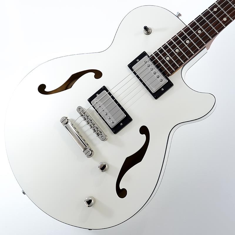 ■商品紹介ゴダンの本格セミアコ「Montreal Premiere」！Montreal Premiereはやや小ぶりで持ち回りしやすいゴダン・セミアコのニューモデル。センターブロックにホロー部分を持たせたオリジナルのBreathe-Thru構造から生み出すボディ鳴りとレゾナンスをサウンドとトーンに反映したモデルです。2フレット、24 3/4″スケール、ナット幅42.86mm、マホガニーセットネックの伝統的なセミアコ・スタイルを周到。定評のグラフテックのレゾマックス・ブリッジシステムを採用。ネック側にSeymour Duncan Jazz(SH-2n)、ブリッジ側 Godin Originalハムバッカーを搭載。ボディとネックの一体感のあるレゾナンスとゴダン・ハンバッカーの相性は抜群で、非常に透明感のあるサウンドとトーンをプロデユース。ゴダンならではの本格セミアコです。驚きは約50mmのブロックを削り出して、ボディの輪郭とセンターが一体成型される。空間を大きく取っているので、鳴りも空間を感じさせる新しい透明感のあるセミアコサウンドとトーンをプロデュース。シングルカットの為6弦側のボディとネックの密着が多くセミアコの中でも低域の鳴りが豊かです。ボディの塗装は下地が薄っすら見えるシースルーです。■仕様詳細[SPEC]Back and Sides.....Canadian Wild CherryTop Canadian.....Wild CherryNut Width.....42.8625 mmNeck.....MahoganyFingerboard.....RosewoodScale Length.....24.75 (628.65 mm)Fingerboard.....Radius 12 (304.8 mm)Nut Type.....GraphtechFrets.....22Machine Head.....Ratio Bass side 18:1， Treble side 26:1Neck Pickup.....Seymour Duncan Jazz SH-2nBridge Pickup.....Godin Custom HumbuckerBridge and Tailpiece.....GraphTech ResomaxControls 1V， 1x T， 3-way SwitchColor.....Trans WhiteFinish Semi.....GlossString Guages .010 .013 .017 .026 .036 .046Weight.....2.9[Kg]専用Gig Case付属検索キーワード：イケベカテゴリ_エレキギター_その他_Godin_アウトレット SW_Godin_アウトレット JAN:2500010864145 登録日:2026/03/27 エレキギター ゴダン