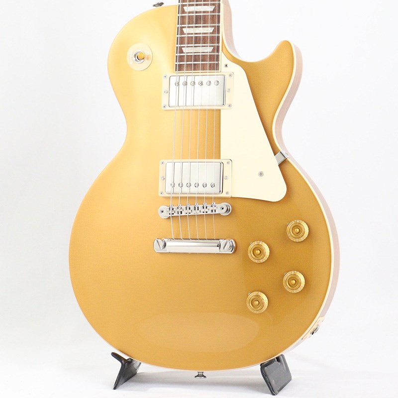 楽器種別：新品エレキギター/Gibson 商品一覧＞＞エレキギター/Gibson/Les Paul Models 商品一覧＞＞エレキギター【225，000円〜420，000円】 商品一覧＞＞当店のギターは、出荷前に専門スタッフが検品・調整しているので安心です！Gibson Les Paul Standard '50s (Gold Top) [SN.200840361]商品説明Gibson Les Paul Standard '50sギブソンの定番モデル「レスポール・スタンダード」が入荷！コチラは、王道のメイプルトップ、マホガニーバックを採用したクラシックな50'sルックスモデルです。ウエイトリリーフを施さないソリッドボディを採用、ネックシェイプは程よいグリップ感のあるVintage 50sを採用しています。キャビティはトラディショナルモデルと同様に、基盤を使わず配線されており、コンデンサーはオレンジドロップが使われております。サウンドの要であるピックアップには、バーストバッカー1&バーストバッカー2を搭載。野太いクリーントーンはもちろん、歪ませても無骨でありながらもバランスの良いドライブサウンドを奏でてくれます。ギブソン王道のロックサウンドを求めるギタリストには是非ともオススメの1本です。是非この機会をお見逃しなく！商品詳細Weight≒4.38kgBodyMaterial: MahoganyTop: MapleWeight Relief: NoneNeckNeck: MahoganyProfile: Vintage 50sNut width: 1.695 / 43.05mmFingerboard: RosewoodScale length: 24.75 / 628.65mmNumber of frets: 22Nut: Graph TechInlay: Acrylic TrapezoidsHardwareBridge: ABR-1 Tune-O-MaticTailpiece: Aluminum Stop BarKnobs: Amber Top Hats w/ PointersPlating: NickelElectronicsNeck Pickup: Burstbucker 1Bridge Pickup: Burstbucker 2Controls: 2 Volumes， 2 Tones & Toggle Switch (Hand-wired with Orange Drop Capacitors)ハードケース付属イケベカテゴリ_ギター_エレキギター_Gibson_Les Paul Models_新品 JAN:4580228786925 登録日:2024/03/27 エレキギター ギブソン レスポール