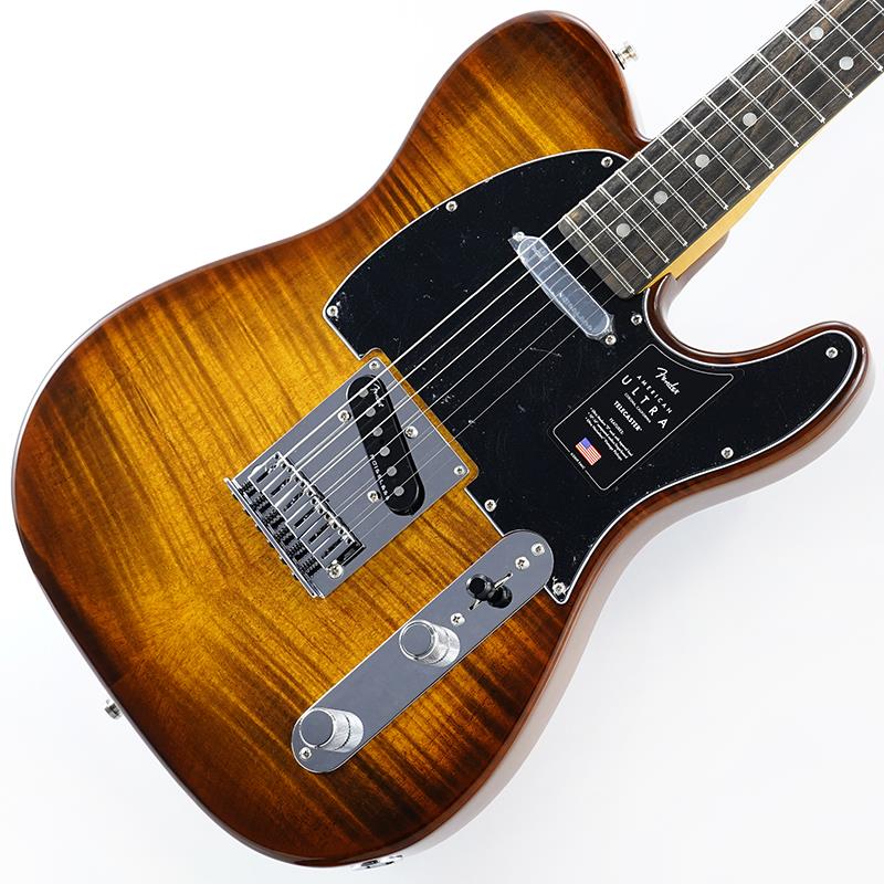 楽器種別：新品Fender USA/American Ultra 商品一覧＞＞Fender USA/新品 商品一覧＞＞エレキギター【220，000円〜415，000円】 商品一覧＞＞STタイプ/Fender USA 商品一覧＞＞当店のギターは、出荷前に専門スタッフが検品・調整しているので安心です！Fender USA FSR Limited Edition American Ultra Telecaster (Tiger's Eye) SN.US23054840 【国内イケベ限定販売モデル】商品説明フレイムメイプルトップにタイガーアイカラーを組み合わせ、指板に希少なエボニー材を使用した限定モデルが国内イケベ独占入荷！American Ultraは、究極の精度、パフォーマンス、トーンを求める卓越したプレイヤーのための、最も先進的なギターとベースをラインナップしたシリーズです。American Ultra Telecasterは、22本のミディアムジャンボフレットを装備した10-14インチのコンパウンドラジアス指板をフィーチャーした独自Modern Dシェイプネックを装備しています。指板エッジには丁寧なエッジのロールオフ加工が施され、ボディとネックヒール部には新たなコンター加工を採用。まるで体の一部に溶け込むような快適な弾き心地を実現しています。Ultra Noiseless Vintageピックアップと高度なワイヤリングオプションは、ハムノイズを排除した無限の音色の可能性を提供します。深めのコンター加工を施したリアボディは機能的であると同時に美しく、S-1スイッチによりどのピックアップポジションでもネックピックアップをOnにすることができます。このオールマイティーで最先端の楽器は、あなたの演奏を新たな高みへと押し上げるでしょう。その他、シールドロッキングチューニングマシン、クロムハードウェア、ボーンナットなどの特徴を備えています。プレミアムなモールドハードシェルケースが付属します。本モデルは、国内では池部楽器店の取扱いのエクスクルーシブモデルとなり、数量限定でのご提供となります。Weight≒3.39kgハードケース付属商品詳細NeckNECK MATERIAL: MapleNECK FINISH: Ultra Satin Urethane with Gloss Headstock FaceNECK SHAPE: Modern DNECK CONSTRUCTION: 4-Bolt StandardFINGERBOARD RADIUS: 10 to 14 Compound Radius (254 mm to 355.6 mm)FINGERBOARD MATERIAL: Streaked EbonyPOSITION INLAYS: White Pearloid DotSIDE DOTS: WhiteNUMBER OF FRETS: 22TRUSS ROD: Bi-FlexSTRING NUT: BoneNUT WIDTH: 1.685 (42.8 mm)NUT MATERIAL: BoneBodyBODY: Alder with Flame Maple TopBODY FINISH: Gloss UrethaneBODY SHAPE: TelecasterBODY TOP: Flame MapleBODY BACK: AlderBODY STYLE: Solid BodyBODY MATERIAL: Alder with Flame Maple TopHardwareBRIDGE: 6-Saddle American Tele with Chromed Brass SaddlesPICKGUARD: 3-Ply BlackCONTROL KNOBS: Knurled Flat-TopSWITCH TIP: BlackHARDWARE FINISH: Nickel/ChromeTUNING MACHINES: Deluxe Cast/Sealed Locking (all short posts)STRINGS: Fender USA 250L Nickel Plated Steel (.009-.042 Gauges)NECK PLATE: 4-Bolt AsymmetricalSTRAP BUTTONS: LockingElectronicsBRIDGE PICKUP: Ultra Noiseless Vintage TeleNECK PICKUP: Ultra Noiseless Vintage TelePICKUP CONFIGURATION: SSCONTROLS: Master Volume (S-1 Switch)， Master ToneSWITCHING: 3-Position Blade:Position 1. Bridge PickupPosition 2. Bridge and Neck PickupsPosition 3. Neck PickupSPECIAL ELECTRONICS: S-1 Switch Activates Series Wiring Option in Middle Pickup Positionイケベカテゴリ_エレキギター_STタイプ_Fender USA_American Ultra_新品 SW_Fender USA_新品 JAN:0717669655471 登録日:2024/04/07 エレキギター フェンダー ふぇんだー フェンダーUSA アメリカンウルトラ アメトラ