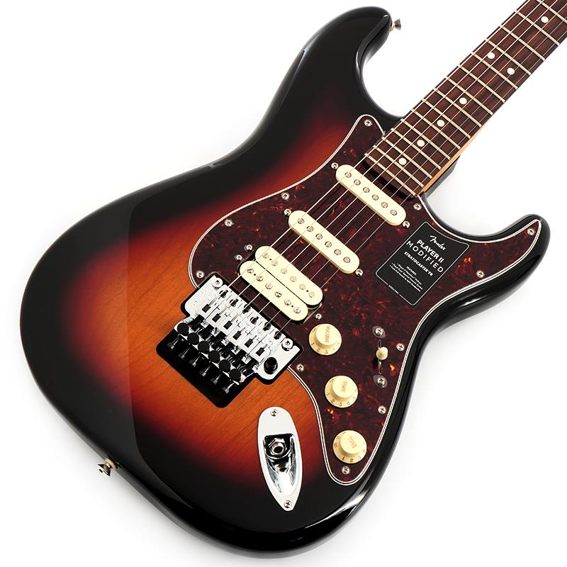 楽器種別：新品Fender MEX/Player 商品一覧＞＞Fender MEX/新品 商品一覧＞＞エレキギター【110，000円〜210，000円】 商品一覧＞＞STタイプ/Fender MEX 商品一覧＞＞当店のギターは、出荷前に専門スタッフが検品・調整しているので安心です！Fender MEX Player II Modified Stratocaster HSS Floyd Rose (3-Color Sunburst/Rosewood)商品説明Fender Mexico Player II Modified Series現代のギタリストやベーシストのための主要なアップグレードが施されたPlayer II Modifiedは、あなたのパフォーマンスを次のレベルに引き上げてくれる多用途な製品をラインアップしています。Player II Modified Stratocaster HSS Floyd Roseは、モダンプレイヤーを念頭に置いて設計されたクラシカルなギターです。Modern Cネックシェイプ、シルキーなサテンウレタンフィニッシュを施したネックバック、12インチラジアスのスラブローズウッド指板、滑らかにロールオフ処理された指板エッジ、22本のミディアムジャンボフレットなど、ネックに注がれたすべてのディテールが、高速で流れるようなプレイアビリティをサポートします。アルダーボディはフェンダーらしいパンチのあるトーンが特徴で、様々な新しいカラーフィニッシュが用意されています。Player IIハムバッカーは明瞭度の高いパワフルなサウンドを提供し、Player II Noiselessピックアップは、不要なノイズを抑制しながら、クラシックなストラトの煌びやかなトーンを奏でます。トーン2ノブに備えられたプッシュ／プルスイッチ機能は、ハムバッカーをコイルスプリットし、シングルコイルとして使用することも可能です。Floyd Rose Specialトレモロはアグレッシブなアーミングを行っても、チューニングの安定性を堅牢に維持します。※画像はサンプルです。製品の特性上、杢目、色合いは個体ごとに異なります。商品詳細Body Material: AlderBody Finish: Gloss PolyesterNeck: Maple， Modern CNeck Finish: Satin UrethaneFingerboard: Rosewood， 12 (305 mm)Frets: 22， Medium JumboPosition Inlays: White Dot (Rosewood)Nut (Material/Width): Floyd Rose R3 Locking， 1.6875Tuning Machines: Standard Cast/SealedScale Length: 25.5 (64.77 cm)Bridge: Floyd Rose Special Double-Locking TremoloPickguard: 3-Ply Black/White/Black or 4-Ply TortoiseshellPickups:Player II Modified Humbucker (Bridge)Player II Noiseless Strat (Middle)Player II Noiseless Strat (Neck)Pickup Switching: 5-Position Blade:Position 1. Bridge PickupPosition 2. Bridge and Middle PickupPosition 3. Middle PickupPosition 4. Middle and Neck PickupPosition 5. Neck PickupAuxiliary Switching: Push/Pull Pot On Tone 2 For Coil Split on Humbucking PickupControls: Master Volume with Treble-Bleed， Tone 1. (Neck/Middle Pickups)， Tone 2. (Bridge Pickup)Control Knobs: Aged White Plastic or Parchment PlasticHardware Finish: Nickel/ChromeStrings: Fender USA 250L Nickel Plated Steel (.009-.042 Gauges)， PN 0730250403Case/Gig Bag: Included: Deluxe Gig Bagイケベカテゴリ_エレキギター_STタイプ_Fender MEX_Player_新品 SW_Fender MEX_新品 JAN:0885978398621 登録日:2025/11/07 エレキギター フェンダー ふぇんだー フェンダーMEX フェンダーメキシコ
