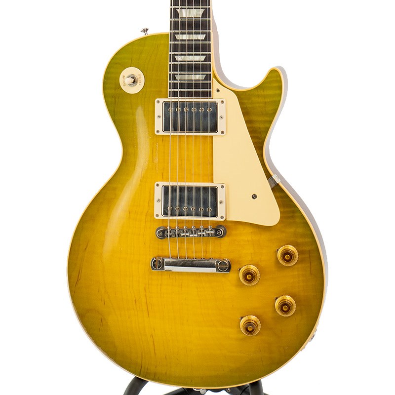 楽器種別：新品エレキギター/Gibson 商品一覧＞＞エレキギター/Gibson/Custom Shop 商品一覧＞＞エレキギター【715，000円〜1，335，000円】 商品一覧＞＞当店のギターは、出荷前に専門スタッフが検品・調整しているので安心です！Gibson Murphy Lab 1959 Les Paul Standard Reissue Green Lemon Fade Light Aged 【S/N 932859】商品説明ロックハウスイケベ池袋/ハンドセレクトトップ材を使用したMurphy Lab Light Agedが入荷！長きに亘り培われた高い製作技術と飽くなき探究心、厳選されたマテリアルにより至高のエレキギター・ベースを製作するために1993年に立ち上げられたGibson Custom Shop。現在もなお昔ながらのハンドクラフト製法と、徹底的に追求したヴィンテージの知識から製作されたカスタムショップ・ラインナップは、他所の追従を許さないほどの見事な作りとなり、プレイヤーの内に秘めるインスピレーションを際限なく沸き立たせてくれる最高の愛機となるでしょう。本機は4段階で設けられたエイジングレベルで2段階目の「Light Aged」が施された1959 Les Paul Standard Reissueです。大切に弾き込まれたかのようなエイジングが全体に見受けられます。トップはハンドセレクトのフィギュアドを採用しており角度によって揺らめく繊細な杢はオーディエンスはもちろん弾き手も満足させる表情です。生音はアコースティカルな出音をしており、アンプを繋がなくとも満足できる音色です。PUにはCustom Shop定番の「Custombucker Alnico III」を採用。独特のバイト感はレコードで聴いた憧れのレスポールを彷彿とさせるサウンドではないでしょうか。新たに搭載されたバンブルビータイプのペーパーオイルコンデンサーやヴィンテージカーブを追及した500KのCTSポットを装備。通常仕様の500kΩポットに比べてボリュームを絞っても極端に高域が削られず、手元の操作でクリーンサウンドからドライブサウンドまでを自在に操ることができます。10〜6のメモリまでは歪みが維持され、6〜1にかけて滑らかにダウンしていくので、ボリュームコントロールの長さによって表情豊かなプレイを可能にしています。4kgを切る軽量個体ながらロックサウンドをガツンと味わえる1本です。S/N 932859Weight≒3.82kg商品詳細Body: Hand Selected 2-Piece Figured Maple Top & 1-Piece Lightweight MahoganyNeck: Solid MahoganyProfile: Authentic ’59 Medium C-ShapeFingerboard: Indian RosewoodFrets: Historic Medium-JumboNut: NylonHardware: Nickel Light AgedBridge: No-Wire ABR-1 & Lightweight Aluminum TailpieceMachinehead: Kluson ReissuePickups: Custombucker Alnico III (Unpotted)Control: 2Volume-2Tone-3way Toggle SWカスタムショップ・ブラウン・ハードケース、認定書他付属イケベカテゴリ_ギター_エレキギター_Gibson_Custom Shop_新品 JAN:4570155998966 登録日:2023/10/02 エレキギター ギブソン カスタムショップ