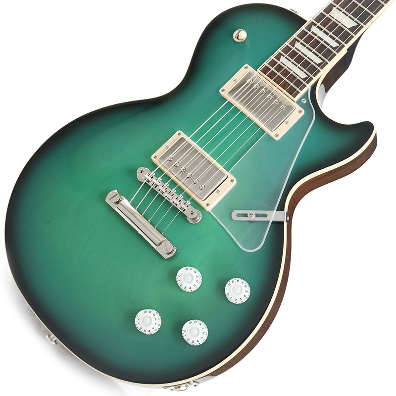 楽器種別：新品エレキギター/Gibson 商品一覧＞＞エレキギター/Gibson/Les Paul Models 商品一覧＞＞エレキギター【220，000円〜410，000円】 商品一覧＞＞当店のギターは、出荷前に専門スタッフが検品・調整しているので安心です！Gibson MOD Collection Les Paul Classic (Cenote Burst) [SN.202820402]商品説明2023年にNashville Factoryで選定したMOD Collectionが入荷！！〜MOD/DEMO Collectionとは〜ギター製造工程で外観に瑕疵が生じたギターを専門のクラフツマンが修理、カスタマイズし完全なワンオフモデルの製品として販売する商品となっております。MOD/DEMO製品にしか採用されていないカラーやカタログにはないスペックを採用しまさに唯一無二-One and Only-な製品となります。当個体はLes Paul Classicをベースにカタログ外カラーのCenote Burstを採用したモデルとなっております。基本スペックはLes Paul Classicと同じですが、Les Paul Classicの特徴ともいえるCoil Tap、Pure Bypass/Phaseは搭載されておらずLes Paul Standardと同じシンプルなコントロールとなっております。PUはBurstbucker61を採用しておりますがオープンゼブラではなくカバードとなっております。ピックガードはクリアガードとなっており、ノブパーツは通常Gold Top HatsのところWhite Speed Knobとなっており緑のボディカラーに差し色として目立つ配色となっております。1本モノのMOD Collection品となりますため、気になる方はお見逃しなく！！※MOD/DEMO Collectionは製造工程で外観に瑕疵が生じたギターをカスタマイズした物となりますため外観面の瑕疵につきましては保証対象外となります。予めご了承ください。※ヘッド裏に「MOD」の刻印がございます。商品詳細Weight≒5.20kg【SPEC】Body: Maple Top & MahoganyNeck: Solid MahoganyProfile: Slim TaperFingerboard: RosewoodFrets: Medium-JumboNut: NylonHardware: NickelBridge: ABR-1 & Aluminum TailpieceMachinehead: GroverNeck Pickup: Burstbucker 61RBridge Pickup: Burstbucker 61TControl: 2Volume-2Tone-3way Toggle SWハードケース付属イケベカテゴリ_ギター_エレキギター_Gibson_Les Paul Models_新品 JAN:4570156000767 登録日:2024/01/12 エレキギター ギブソン レスポール