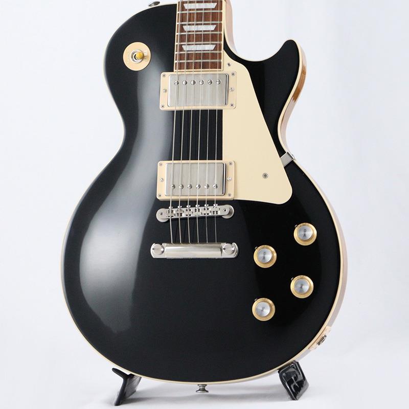 楽器種別：アウトレットGibson/Les Paul Models 商品一覧＞＞Gibson/アウトレット 商品一覧＞＞エレキギター【180，000円〜345，000円】 商品一覧＞＞レスポールタイプ/Gibson 商品一覧＞＞当店のギターは、出荷前に専門スタッフが検品・調整しているので安心です！Gibson Les Paul Standard '60s Plain Top (Ebony) [SN.221430245] 【B級特価】商品説明B級アウトレットスペシャルプライス！Gibson Les Paul Standard '60s Custom Color SeriesCustom Color Seriesは、1960年代のギブソンのクラシカルなカスタムカラーと、近年のリミテッドランに採用された人気カラーからインスピレーションを得て誕生したモデルであり、ギブソンファンの皆様に、エキサイティングなカラーのレスポール・スタンダードをお届けします。ギブソンの定番モデル「レスポール・スタンダード」が入荷！コチラは、プレーンメイプルトップやスリムテーパーのネックシェイプを採用した60's仕様採用モデルです。ウエイトリリーフを施さないソリッドボディに、握りやすいスリムテーパーのネックをジョイント。キャビティはトラディショナルモデルと同様に、基盤を使わず配線されており、コンデンサーはオレンジドロップが使われております。サウンドの要であるピックアップには、60s Burstbuckerを搭載。芯のあるクリーントーンはもちろん、歪ませても骨太でバランスの良いドライブサウンドを奏でてくれます。ギブソン王道のロックサウンドを求めるギタリストには是非ともオススメの1本です。是非この機会をお見逃しなく！※本商品はB級特価品となります為、細かな擦り傷や、パーツのくすみが散見します。※掲載画像以外の外観瑕疵部分がある場合がございます。※保証に関しましてはプレイアビリティに関する点のみとなり、通常とは異なるアウトレット保証となります。商品詳細Weight≒4.51kgBodyMaterial: MahoganyTop: Plain MapleWeight Relief: NoneBinding: Single-ply Top and FretboardNeckNeck: MahoganyProfile: Slim TaperNut width: 1.695 / 43.05mmFingerboard: Indian RosewoodScale length: 24.75 / 628.65mmNumber of frets: 22Nut: Graph TechInlay: Acrylic TrapezoidsHardwareBridge: ABR-1 Tune-O-MaticTailpiece: Aluminum Stop BarTuners:Grover Rotomatics w/ Kidney ButtonsPlating:NickelElectronicsNeck pickup: 60s BurstbuckerBridge pickup: 60s BurstbuckerControls:2 Volumes， 2 Tones & Toggle Switch (Hand-wired with Orange Drop Capacitors)ハードケース付属イケベカテゴリ_エレキギター_レスポールタイプ_Gibson_Les Paul Models_アウトレット SW_Gibson_アウトレット JAN:2500010150712 登録日:2026/03/23 エレキギター ギブソン レスポール