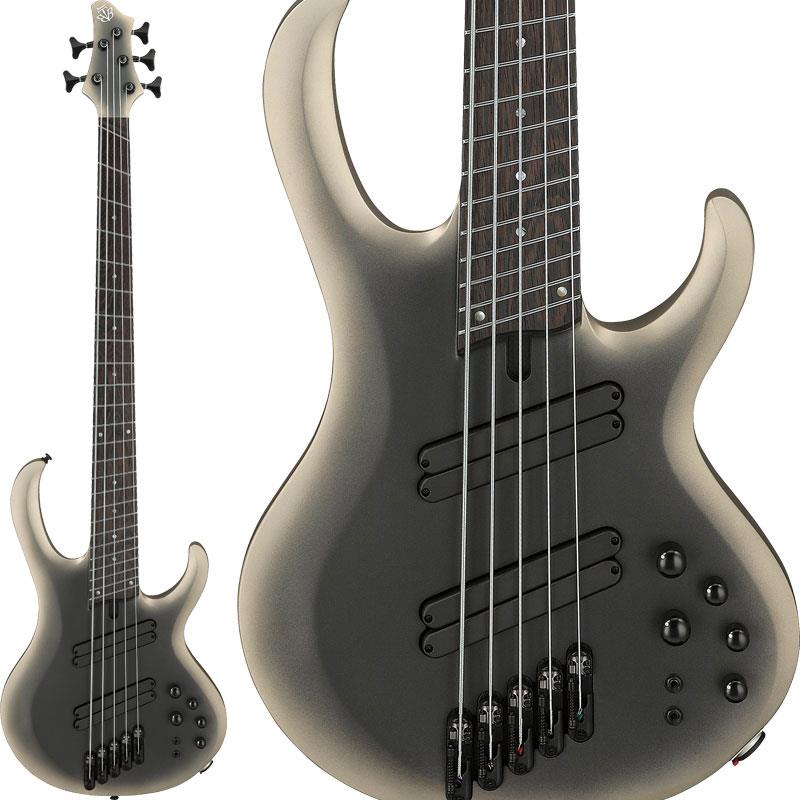 楽器種別：新品Ibanez/BTB (Boutique Bass) 商品一覧＞＞Ibanez/新品 商品一覧＞＞ベース【100，000円〜200，000円】 商品一覧＞＞エレキベース/多弦ベース/Ibanez 商品一覧＞＞当店のベースは、出荷前に専門スタッフが検品・調整しているので安心です！Ibanez BTB605MS-SOM [SPOT MODEL]商品説明BTBマルチ・スケール・モデルのソリッド・カラー仕様。・ロング・サスティーン、豊かなレゾナンスに加え、高い剛性も兼ね備えたスルーネック構造音像のクリアさとアタックに富むメイプル材と硬質なウォルナット材とを組み合わせた5pcネック。ネック内部に装備したグラファイト・ロッドによって剛性を強化しています。スルーネック構造がもたらすロング・サスティーンと豊かなレゾナンス、そして全フレット域に渡るネック・バックのシームレスな演奏感は、BTBベースの最大の特長と言えるでしょう。・5弦側:37インチ〜1弦側:35インチ エクストラ・ロング・マルチ・スケールLow-B弦（5弦）のスケールを37インチに設定することにより低音弦側では通常モデルBTBよりも強めのテンション感を得られ、チューン・ダウンした際の音の明瞭さと芯のあるサウンドに威力を発揮します。Ibanezベースでは最も極端に扇状となるマルチ・スケールで、特に高フレット域におけるテクニカルな運指に利点が多い仕様です。（注：習熟と慣れが必要で、全ての奏者や奏法に共通ではありません。）・オクメ材ウイング・ボディネックをサンドする両翼のウイング・ボディは、中低音域特性に富むオクメ材を採用しています。深くえぐるようなボディのカッタウェイ・スタイルはハイ・ポジションでの弾きやすさに寄与しており、またホーンの形状/デザインは立奏時のバランスの良さを考慮して設計しています。・Ibanez T1ピックアップ低音域のタイトなレスポンス、パンチのある中音域、クリアな高音域を備えたサウンドを目指して設計した、オリジナルのセパレート・コイル2基によるハムバッカーです。丸みを帯びて設計したカバー・エッジは指を置きやすく、また2基のピックアップの端をそれぞれ弦とほぼ平行になるよう若干オフセットして設置することで、他のマルチ・スケール・モデルには無い演奏性の高さをもたらしています。・弦間ピッチ・アジャスト機構搭載MR5S（モノレール）ブリッジ各弦が独立したブリッジで、弦振動をダイレクトにボディへと伝えます。またサドルが左右方向に±1.5mm可動する構造で、弦間ピッチを一定幅自在に設定できます。・3パターンのミッド帯周波数切り替えスイッチを装備したアクティブ3-band EQ & EQバイパス・スイッチワイド・レンジ&低ノイズのアクティブ・サウンドを生み出すイコライザーで、スイッチの切り替えにより中音域の周波数帯を250Hz、450Hz、700Hzに切り替えることが可能です。さらにEQバイパス・スイッチを装備しており、パッシブ・ベースとしても使用可能です。（バイパス時：Trebleノブでトーン・コントロール） （006P電池駆動）・イントネーションの正確さと開放/押弦サウンドの差異を最小限に抑える効果を期待できるゼロ・フレット・ブライトな音質と高い耐久性が特徴のステンレス・フレット・プラグ抜け落ちを防止するロック機能付きのNeutrikジャック・D‘Addario NYXL弦（NYXLB045， NYXLB055， NYXLB080， NYXLB100MS， NYXLB130MS）※画像はサンプルです。製品の特性上、木目・色合いは1本1本異なります。商品詳細SPECSNeck Type: BTB5 for Multi Scale / 5pc Maple/Walnut w/Graphite reinforcement rods / Neck-throughBody: Okoume wing bodyFretboard: Bound Panga Panga fretboard w/Abalone dot inlayFret: Medium Stainless Steel fretsBridge: MR5S bridge (18mm string spacing)Neck Pickup: T1 neck pickupBridge Pickup: T1 bridge pickupEqualizer: Ibanez Custom Electronics 3-band EQ w/EQ bypass switch (passive tone control on treble pot) & 3-way Mid frequency switchHardware: Color BlackStrings gauge: D'Addario NYXL Single Strings (NYXLB045， NYXLB055， NYXLB080， NYXLB100MS， NYXLB130MS)Tuning: 1G，2D，3A，4E，5BNECK DIMENSIONSScale: 939.8mm/37inch - 889mm/35inchWidth: 47mm at NUTWidth: 75mm at 24FThickness: 20mm at 1FThickness: 22mm at 12FRadius: 400mmR専用ハードシェル・ケース付属イケベカテゴリ_ベース_エレキベース_多弦ベース_Ibanez_BTB (Boutique Bass)_新品 SW_Ibanez_新品 JAN:4549763376718 登録日:2026/07/09 エレキベース アイバニーズ イバニーズ