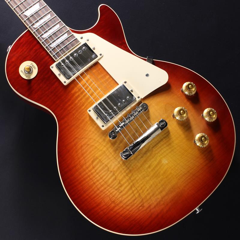 楽器種別：アウトレットGibson/Les Paul Models 商品一覧＞＞Gibson/アウトレット 商品一覧＞＞エレキギター【230，000円〜440，000円】 商品一覧＞＞レスポールタイプ/Gibson 商品一覧＞＞当店のギターは、出荷前に専門スタッフが検品・調整しているので安心です！Gibson Japan Exclusive Les Paul Standard '50s Custom Shop Top (Heritage Cherry Sunburst) #218450209【B級特価】商品説明B級アウトレットスペシャルプライス！Custom Shop Topを採用したJapan Exclusive Modelが入荷しました！！Gibsonの定番モデル「Les Paul Standard '50s」にGibson最上位ラインのCustom Shopに使用されるトップ材を使用した日本ディーラー限定モデルとなっております。Custom Shopらしい奥行きのある杢目は見る角度で表情を変える非常に美しいものとなっております。基本スペックはレギュラーモデルの「Les Paul Standard '50s」と同じくウエイトリリーフを施さないソリッドボディを採用、ネックシェイプは程よいグリップ感のあるVintage 50sを採用しています。キャビティは、基盤を使わず配線されており、コンデンサーはオレンジドロップが使われております。サウンドの要であるピックアップは通常、Burstbucker1，2が搭載されますが当モデルは、57 Classic Underwoundを採用。通常の57 Classicよりも出力を落としたUnderwound仕様となっており出力を抑えることで枯れたビンテージサウンドを再現。手元のコントロールやピッキングニュアンスで様々なサウンドバリエーションを放出し心地よいサウンドを奏でてくれます。近年では珍しい極上杢目の1本ですので是非この機会をお見逃しなく！※本商品はB級特価品となります為、細かな擦り傷や、パーツのくすみが散見します。※掲載画像以外の外観瑕疵部分がある場合がございます。※保証に関しましてはプレイアビリティに関する点のみとなり、通常とは異なるアウトレット保証となります。約4.09kgハードケース付属商品詳細BodyMaterial: MahoganyTop: AAA Custom Shop Figured MapleBinding: Cream; Top and FretboardWeight Relief: NoneNeckNeck: MahoganyProfile: Vintage '50sNut width: 1.695/43.053mmFingerboard: RosewoodScale length: 24.75/628.65mmNumber of frets: 22， Medium JumboNut: Graph TechInlay: Acylic TrapezoidHardwareBridge: ABR-1 Tune-O-MaticTailpiece: Aluminum Stop BarTuners:Vintage Deluxe with Keystone ButtonPlating: NickelElectronicsNeck pickup: 57 Classic UnderwoundBridge pickup: 57 Classic UnderwoundControls: 2 Volume， 2 Tone; Hand-wired with Orange Drop Capacitorsイケベカテゴリ_エレキギター_レスポールタイプ_Gibson_Les Paul Models_アウトレット SW_Gibson_アウトレット JAN:2500010856270 登録日:2026/03/23 エレキギター ギブソン レスポール