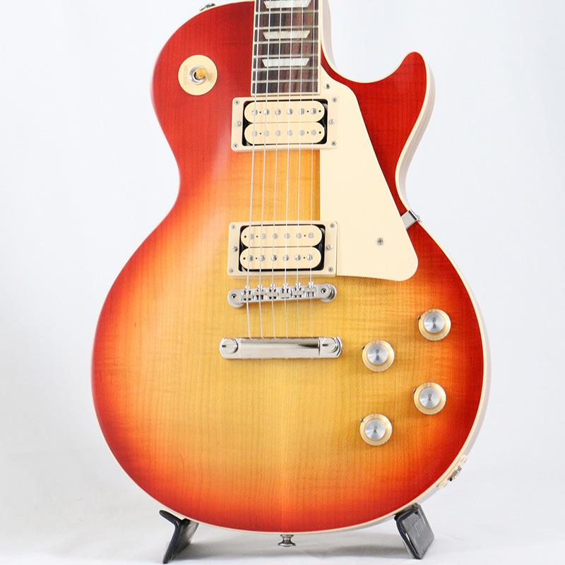 楽器種別：新品Gibson/Les Paul Models 商品一覧＞＞Gibson/新品 商品一覧＞＞エレキギター【210，000円〜400，000円】 商品一覧＞＞レスポールタイプ/Gibson 商品一覧＞＞当店のギターは、出荷前に専門スタッフが検品・調整しているので安心です！Gibson Les Paul Standard '60s Double Trouble (Vintage Cherry Burst) [SN.223450206]商品説明Les Paul Standard '60s Double TroubleLes Paul Standard 60s Double Troubleは、通常のLes Paul Standard 60sモデルと同様の機能と特徴をすべて備えながらも、さらなるヴィンテージの風格が吹き込まれた特別仕様モデルです。この限定生産となるレスポールは、通常のLes Paul Standard 60sモデルとは2つの点で異なります。本モデルにはピックアップ・カバー非装着（オープン・タイプ）のBurstbucker 61RとBurstbucker 61Tピックアップが2基搭載されており、それぞれにダブル・クラシック・ホワイトのボビンとBurstbucker 61標準のアルニコ5マグネットを採用しています。また、フィニッシュにも変更が加えられています。本モデルでは、標準のグロス・ニトロセルロース・ラッカー・フィニッシュのヴィンテージ・カラー・バリエーションを採用。グロス・ニトロセルロース・ラッカー・フィニッシュは1950年代の新品同様の仕上がりを再現していますが、Les Paul Standard 60s Double Troubleでは、わずかに色褪せたフルグロス・ニトロセルロース・ラッカーのヴィンテージ・カラー・フィニッシュを使用しており、年月を経て自然に生じる経年変化の風合いを再現しています。また、カラーはすべて手作業でスプレーされるため、バースト・パターンは個体ごとにわずかに異なります。このような特色が加えられながらも、Les Paul Standard 60sの広く愛される基本仕様に変更はなく、ウェイト・リリーフ無しのソリッド・マホガニー・ボディ、AAグレードのフィギュアド・メイプル・トップ、Slim Taperプロファイルのマホガニー・ネック、ローズウッド指板、22フレット仕様のミディアムジャンボフレット、トラペゾイド・インレイを擁しています。また、ABR-1 Tune-O-Maticブリッジ、アルミ製ストップバー・テイルピース、キドニーボタンのGrover Rotomaticチューナー、シルバーリフレクターとダイヤルポインター付きのゴールド・トップハット・ノブを搭載。オープン・タイプのBurstbucker 61R (ネック) とBurstbucker 61T (ブリッジ)は、ダブル・クラシック・ホワイト・ボビンであること以外は標準のBurstbucker 61と同様の仕様となっています。手作業で製作され、アルニコ5マグネットを使用し、オーディオテーパー・ポットとOrange Dropキャパシターが手配線されています。ダブル・クラシック・ホワイトのボビンとヴィンテージ・フィニッシュの組み合わせにより、Les Paul Standard 60s Double Troubleは気品あるヴィンテージの風格を醸し出しながらも、手の届きやすい価格を実現しています。各カラー500本のみの限定生産となります。商品詳細Weight≒4.29kgBodyMaterial: MahoganyTop: AA Figured MapleBinding: Cream; Top and FretboardNeckNeck: MahoganyProfile: SlimTaperNut width: 1.69/43.053mmFingerboard: RosewoodScale length: 24.75/628.65mmNumber of frets: 22Nut: Graph TechInlay: Acylic TrapezoidHardwareBridge: ABR-1 Tune-O-MaticTailpiece: Aluminum Stop BarTuners:Grover Rotomatic with Kidney ButtonElectronicsNeck pickup: Burstbucker 61R， Double Classic White BobbinsBridge pickup: Burstbucker 61T， Double Classic White BobbinsControls:2 Volume， 2 Tone; Hand-wired with Orange Drop Capacitorsハードケース付属イケベカテゴリ_エレキギター_レスポールタイプ_Gibson_Les Paul Models_新品 SW_Gibson_新品 JAN:4570156011558 登録日:2025/10/09 エレキギター ギブソン レスポール