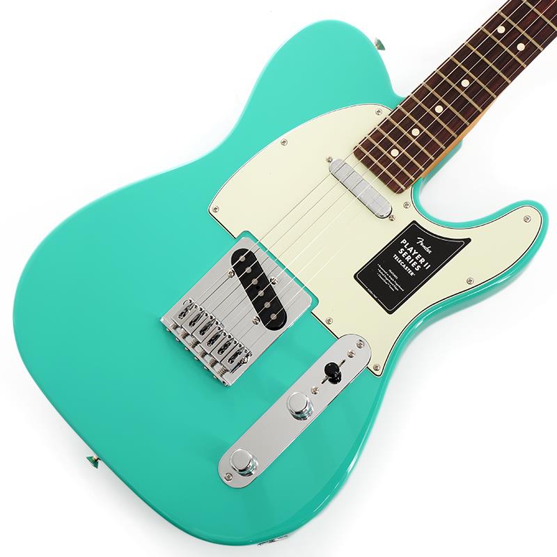 楽器種別：新品Fender MEX/Player 商品一覧＞＞Fender MEX/新品 商品一覧＞＞エレキギター【65，000円〜135，000円】 商品一覧＞＞TLタイプ/Fender MEX 商品一覧＞＞当店のギターは、出荷前に専門スタッフが検品・調整しているので安心です！Fender MEX 75th Anniversary Player II Telecaster (Seafoam Green／Rosewood)商品説明Player II Telecasterは、Fenderならではのアイコニックなサウンドとスタイルを受け継ぎながら、現代のプレイヤーに向けたアップデートを施したステージユースに最適なモデルです。演奏を力強く支え、さらなるインスピレーションを引き出します。Player II Telecasterは、時代を超えて愛されるFenderの魅力を備えながら、現代のプレイヤーのニーズに応える仕様へと進化しています。ネックには、滑らかなサテンウレタンフィニッシュを施したModern Cシェイプを採用し、演奏性を追求。さらに、ロールドエッジ加工を施した9.5インチラジアスのスラブローズウッドまたはメイプル指板と、22本のミディアムジャンボフレットの組み合わせにより、快適でスムーズなフィンガリングを実現します。ボディ材にはアルダー、チェンバードアッシュ、チェンバードマホガニーのオプションを用意し、定番のFenderカラーに加え、アーカイブから復刻された新たなカラーオプションもラインアップしています。Player Series Alnico V Single-Coil Teleピックアップは、透き通るような高域、音楽的な中域、引き締まった低域を実現し、あらゆるジャンルに対応するサウンドを奏でます。3ウェイブレードスイッチにより、ネックピックアップの滑らかでベルのような響きから、ブリッジピックアップの鋭いトゥワングサウンド、その中間の多彩なサウンドまで自在に選択できます。さらに、6サドルブリッジ、ブロックスチールサドル、ClassicGearチューナーを搭載し、高いチューニング安定性を実現。幅広いサウンドメイクに対応する柔軟性を備えています。自分だけのサウンドを追求するプレイヤーに最適なPlayer II Telecasterは、Fenderならではのルックス、トーン、そして演奏性を兼ね備えたモデルです。※画像はサンプルです。製品の特性上、杢目、色合いは個体ごとに異なります。商品詳細Body Material： AlderBody Finish： PolyesterNeck： Maple， Modern CNeck Finish： Satin UrethaneFingerboard： Maple or Rosewood， 9.5 (241 mm)Frets： 22， Medium JumboPosition Inlays： Black Dot (Maple)， White Dot (Rosewood)Nut (Material/Width)： Synthetic Bone， 1.650 (42 mm)Tuning Machines： Fender ClassicGearScale Length： 25.5 (648 mm)Bridge： 6-Saddle String-Through-Body Tele with Block Steel SaddlesPickguard： 3-Ply ParchmentPickups： Player Series Alnico 5 Tele Single-Coil (Bridge)， (Middle)， Player Series Alnico 5 Tele Single-Coil (Neck)Pickup Switching： 3-Position Blade Position 1. Bridge Pickup， Position 2. Bridge and Neck Pickups， Position 3. Neck PickupControls： Master Volume， Master ToneControl Knobs： Knurled Flat-TopHardware Finish： Nickel/ChromeStrings： Fender USA 250L Nickel Plated Steel (.009-.042 Gauges)ソフトケース付属イケベカテゴリ_エレキギター_TLタイプ_Fender MEX_Player_新品 SW_Fender MEX_新品 JAN:0197955229386 登録日:2026/07/24 エレキギター フェンダー ふぇんだー フェンダーMEX フェンダーメキシコ